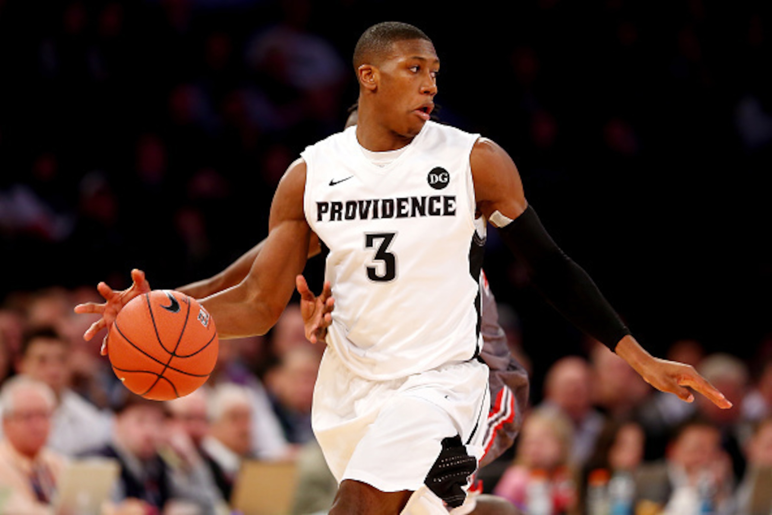 NEW YORK, NY - MARCH 12: Kris Dunn #3 of the Providence Friars brings the ball up the floor under pressure by the St. John's Red Storm during a quarterfinal game of the Big East basketball tournament at Madison Square Garden on March 12, 2015 in New York NEW YORK, NY - MARCH 12: Kris Dunn #3 of the Providence Friars brings the ball up the floor under pressure by the St. John's Red Storm during a quarterfinal game of the Big East basketball tournament at Madison Square Garden on March 12, 2015 in New York
