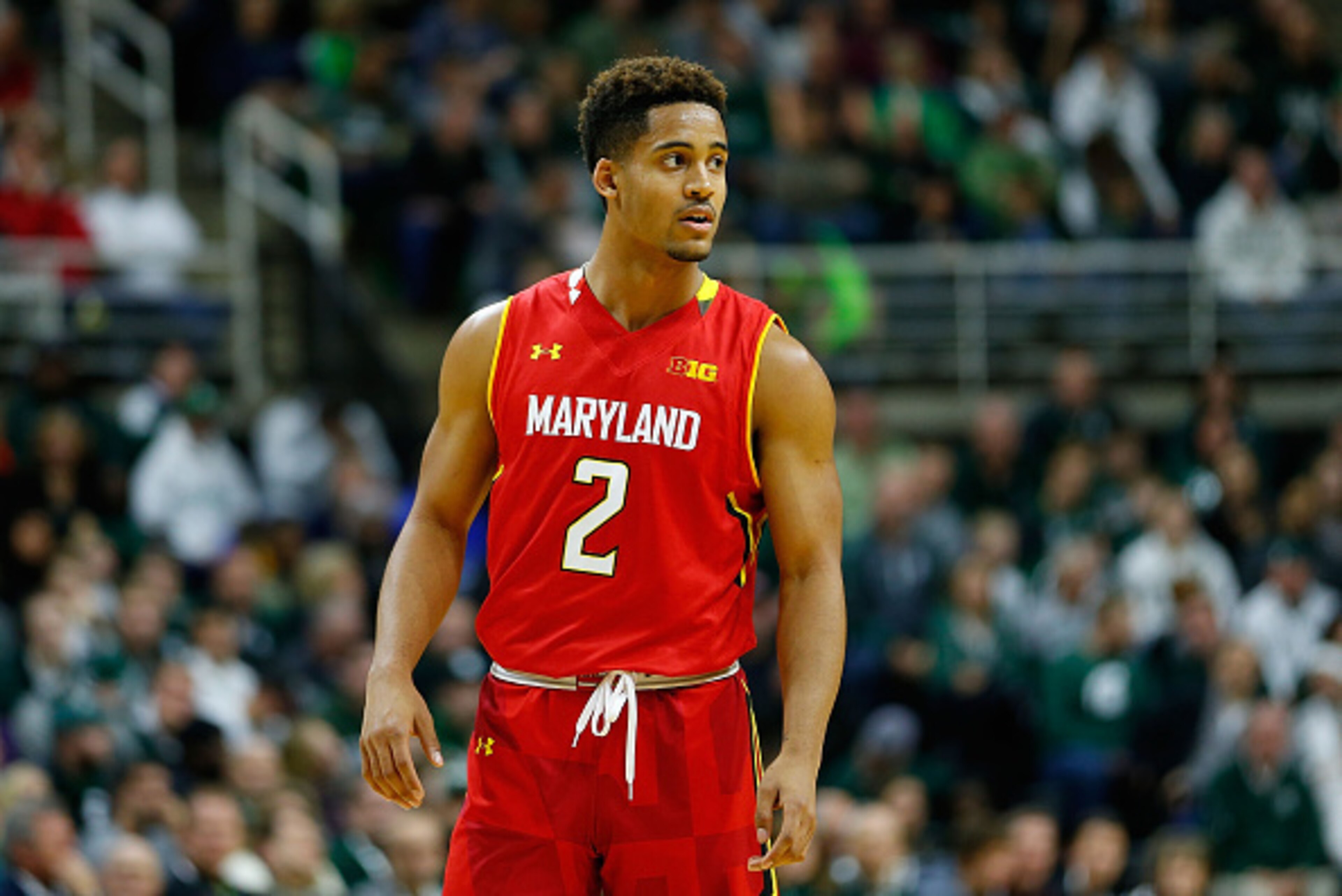 EAST LANSING, MI - DECEMBER 30:  Melo Trimble #2 of the Maryland Terrapins brings the ball up court during the second half of the game against the Michigan State Spartans at Breslin Center on December 30, 2014 in East Lansing, Michigan. Maryland defeated 