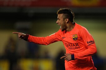 VILLARREAL, SPAIN - MARCH 04: Neymar of FC Barcelona celebrates after scoring his teams opening goal during the Copa del Rey Semi-Final, Second Leg match between Villarreal CF and Barcelona at El Madrigal stadium on March 4, 2015 in Villarreal, Spain.  (P