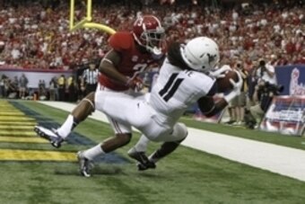 Aug 30, 2014; Atlanta, GA, USA; West Virginia Mountaineers wide receiver Kevin White (11) catches a touchdown pass against Alabama Crimson Tide defensive back Bradley Sylve (3) in the second quarter of the 2014 Chick-fil-A Kickoff Game at the Georgia Dome