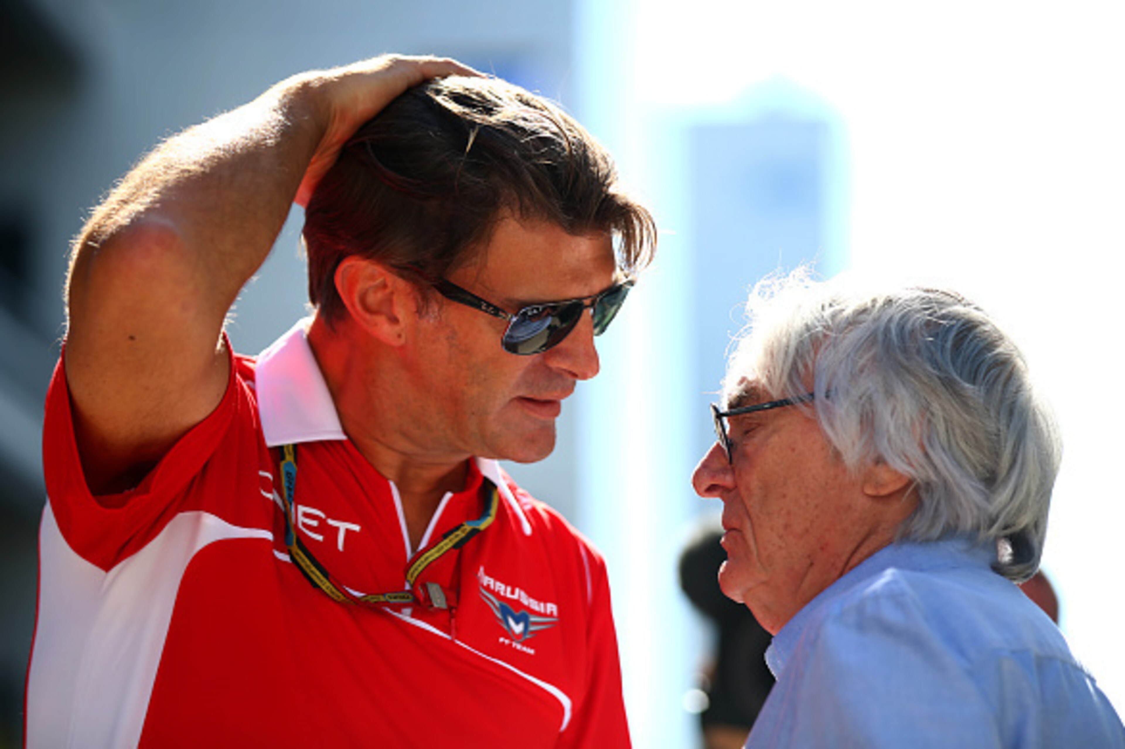 SOCHI, RUSSIA - OCTOBER 09:  F1 supremo Bernie Ecclestone speaks with Graeme Lowdon, President and Sporting Director of Marussia in the paddock during previews ahead of the Russian Formula One Grand Prix at Sochi Autodrom on October 9, 2014 in Sochi, Russ