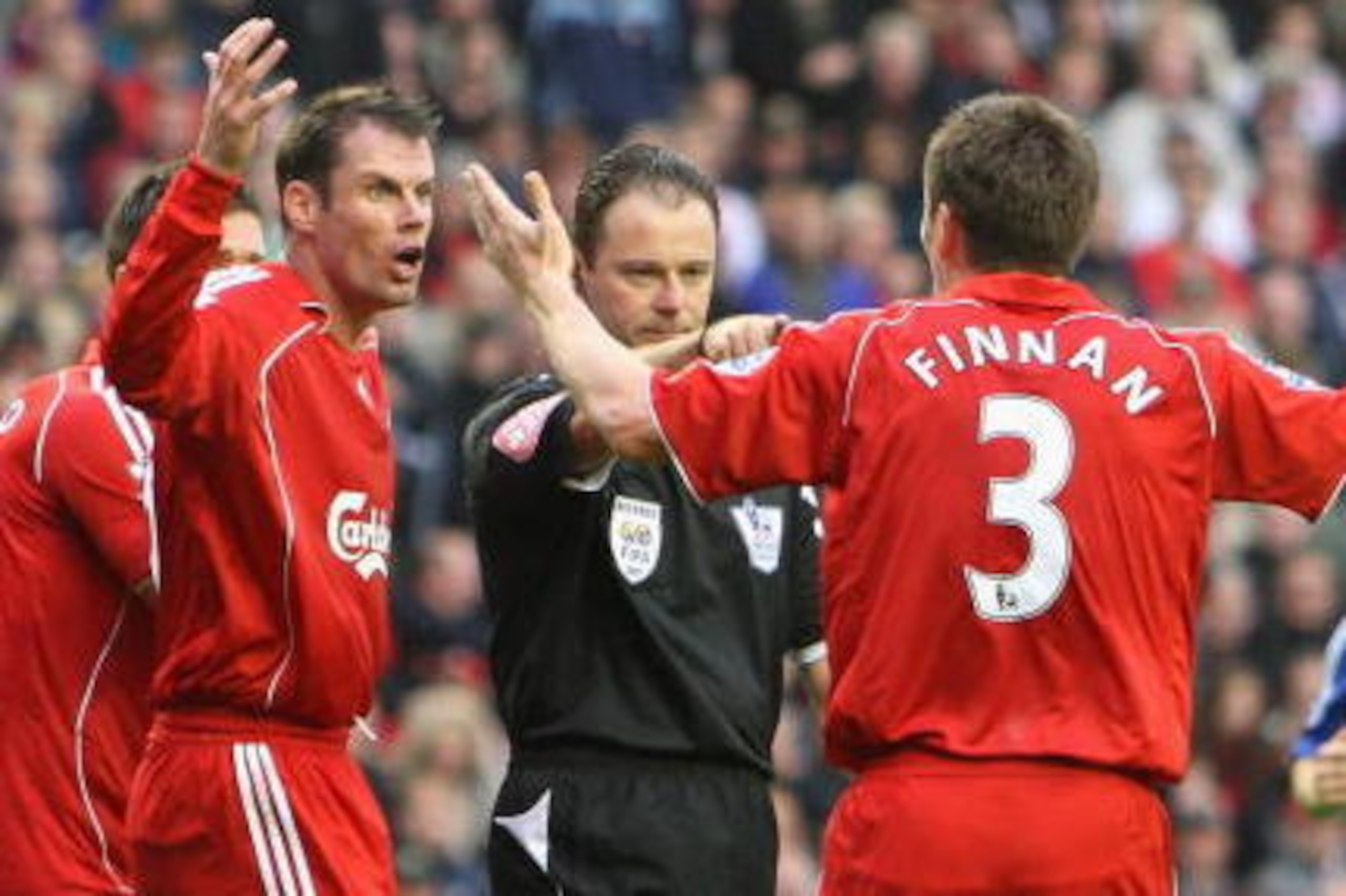 LIVERPOOL, UNITED KINGDOM - AUGUST 19:  Jamie Carragher of Liverpool and team mate Steve Finnan protest against the penalty decision of Referee Rob Styles during the Barclays Premier League match between Liverpool and Chelsea at Anfield on August 19, 2007