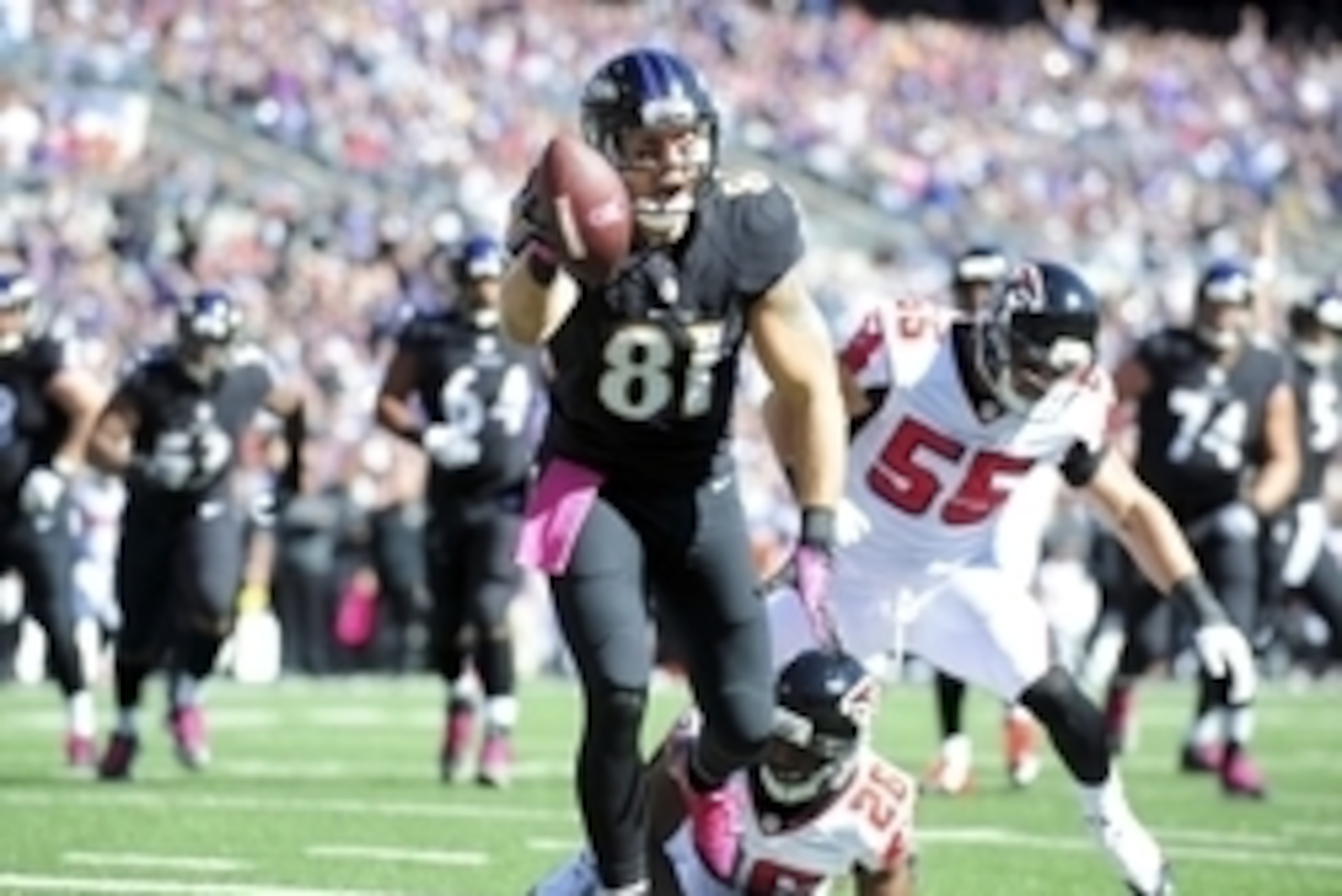 Oct 19, 2014; Baltimore, MD, USA; Baltimore Ravens tight end Owen Daniels (81) catches a touchdown in the first quarter against the Atlanta Falcons at M&T Bank Stadium. Mandatory Credit: Evan Habeeb-USA TODAY Sports