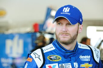 LAS VEGAS, NV - MARCH 07:  Dale Earnhardt Jr., driver of the #88 Nationwide Chevrolet, stands in the garage during practice for the NASCAR Sprint Cup Series Kobalt 400 at Las Vegas Motor Speedway on March 7, 2015 in Las Vegas, Nevada.  (Photo by Jared C. 
