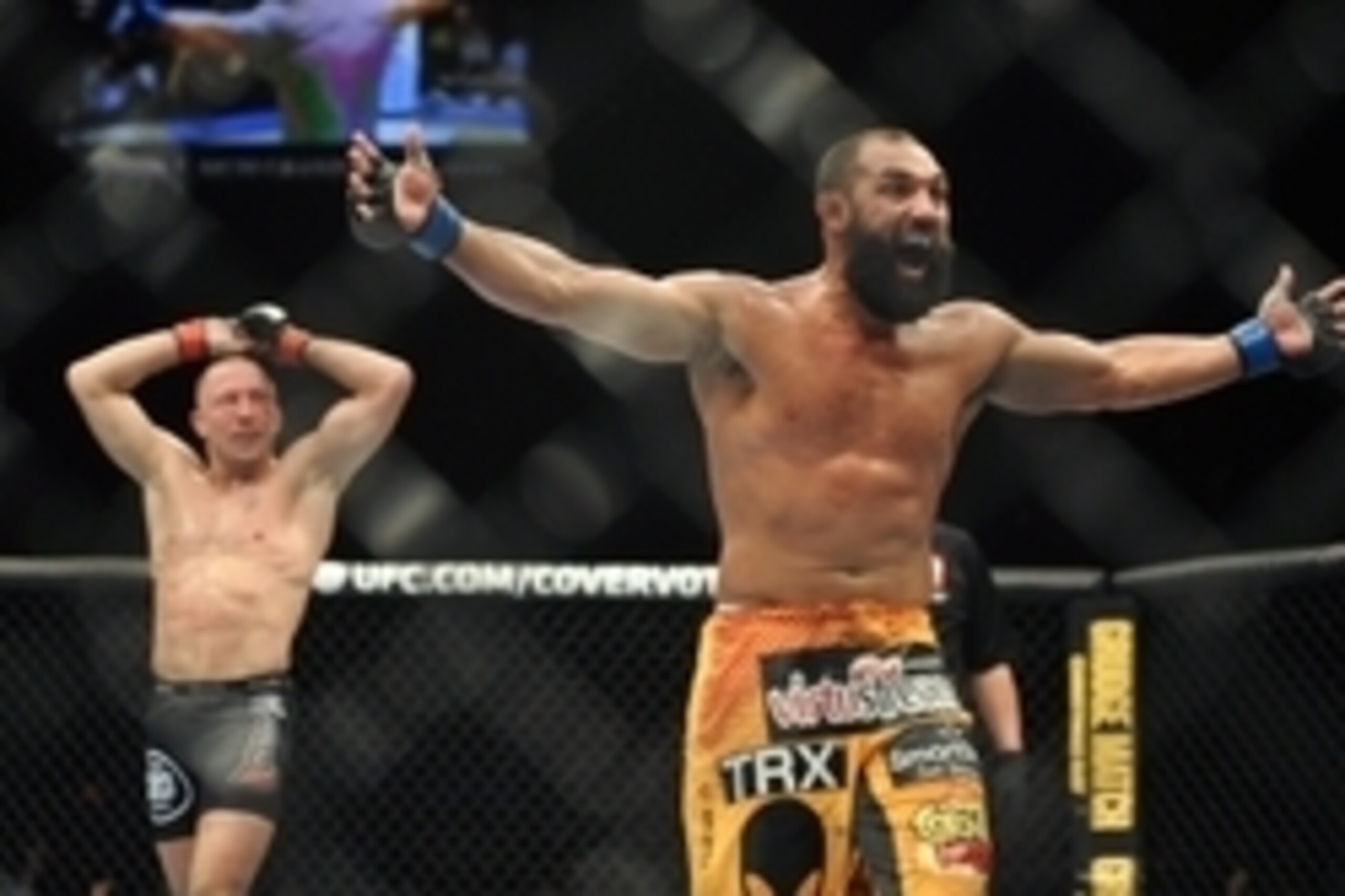 Nov 16, 2013; Las Vegas, NV, USA; Georges St-Pierre (red gloves) and Johny Hendricks (blue gloves) react after their welterweight championship bout during UFC 167 at MGM Grand Garden Arena. Mandatory Credit: Stephen R. Sylvanie-USA TODAY Sports Nov 16, 2013; Las Vegas, NV, USA; Georges St-Pierre (red gloves) and Johny Hendricks (blue gloves) react after their welterweight championship bout during UFC 167 at MGM Grand Garden Arena. Mandatory Credit: Stephen R. Sylvanie-USA TODAY Sports