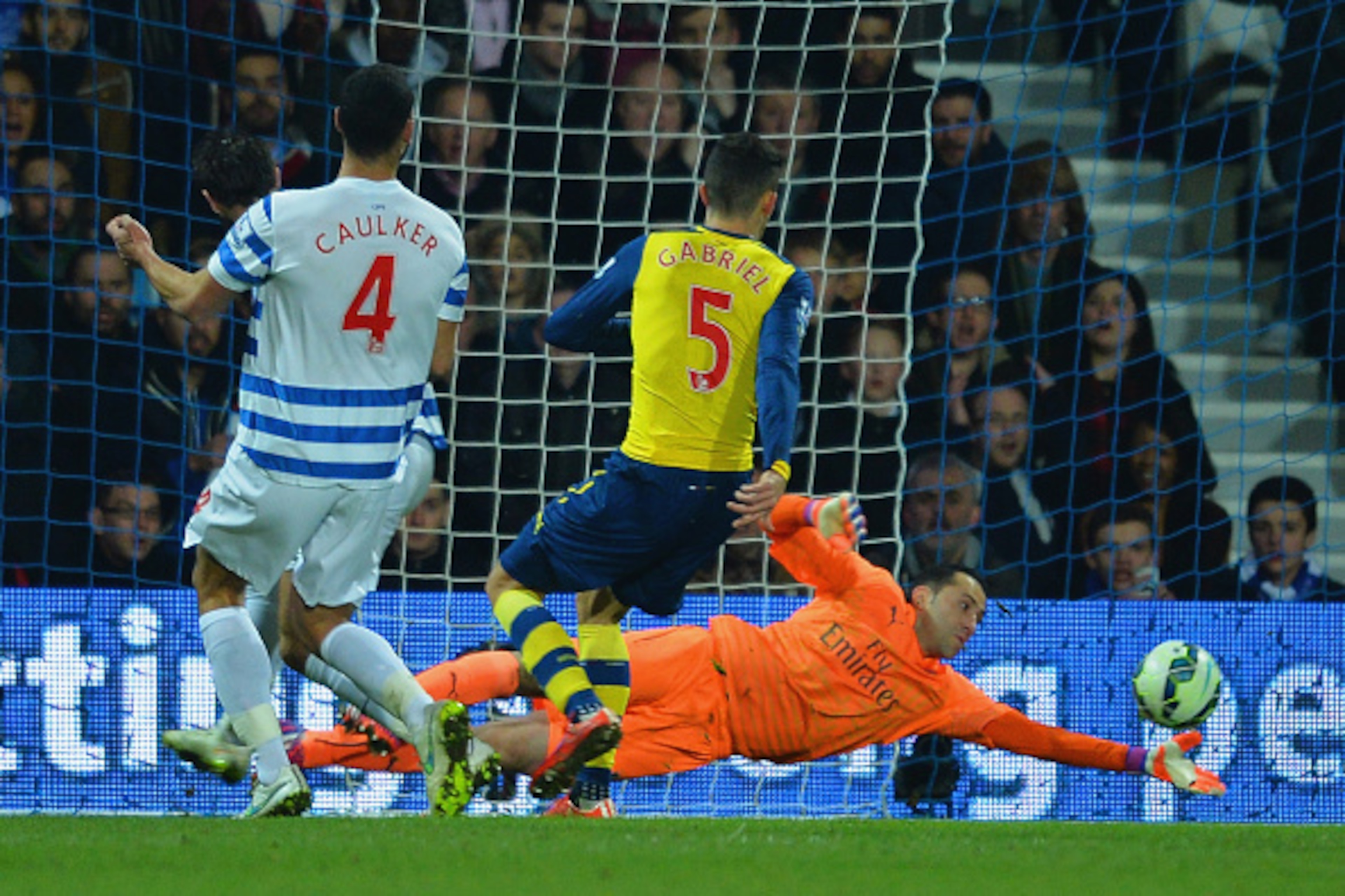 LONDON, ENGLAND - MARCH 04:  Goalkeeper David Ospina of Arsenal makes a save during the Barclays Premier League match between Queens Park Rangers and Arsenal at Loftus Road on March 4, 2015 in London, England.  (Photo by Christopher Lee/Getty Images)