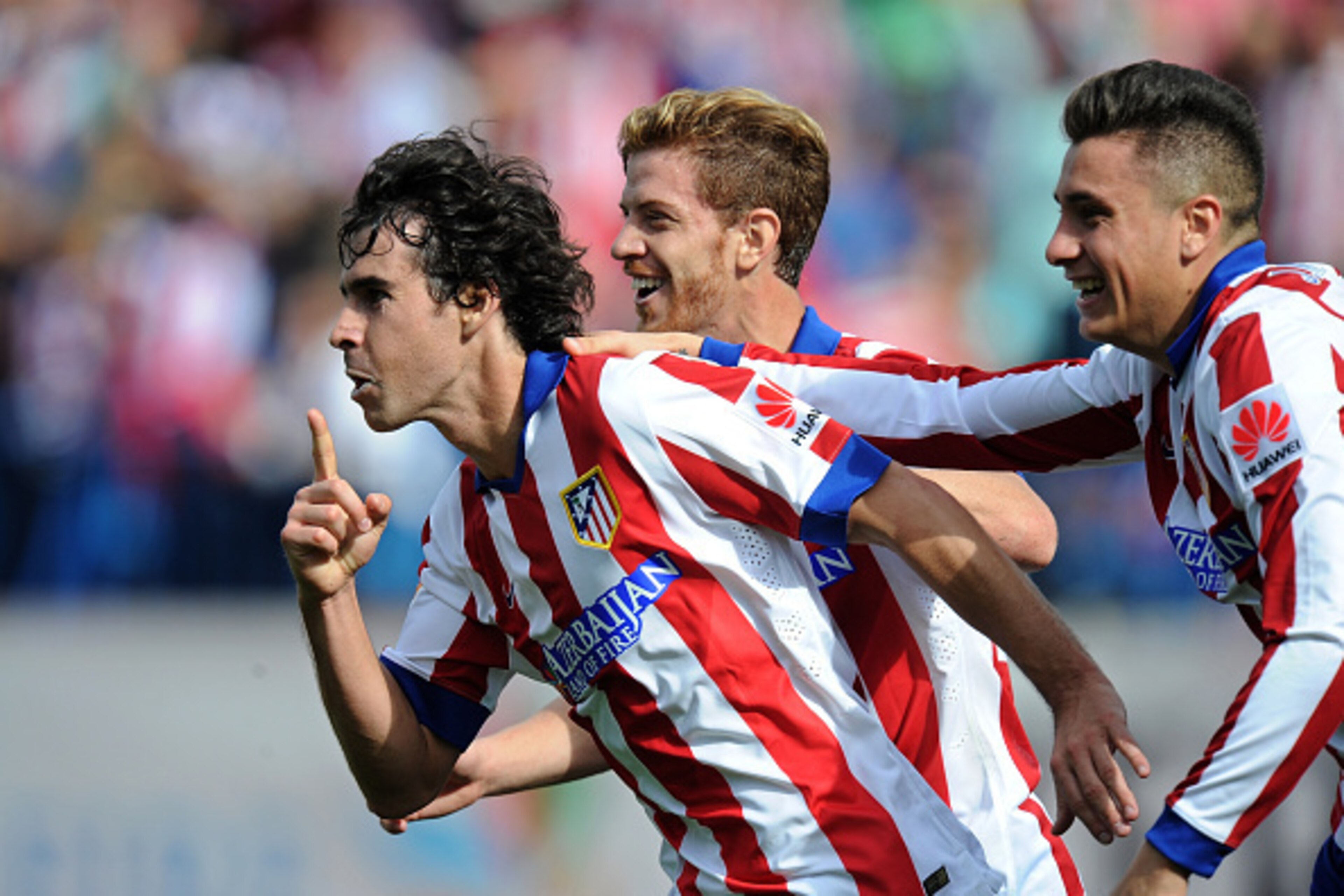 MADRID, SPAIN - OCTOBER 19:  Tiago Mendes of Club Atletico de Madrid celebrates after scoring his team's opening goal during the La Liga match between Club Atletico de Madrid and RCD Espanyol at Vicente Calderon Stadium on October 19, 2014 in Madrid, Spai