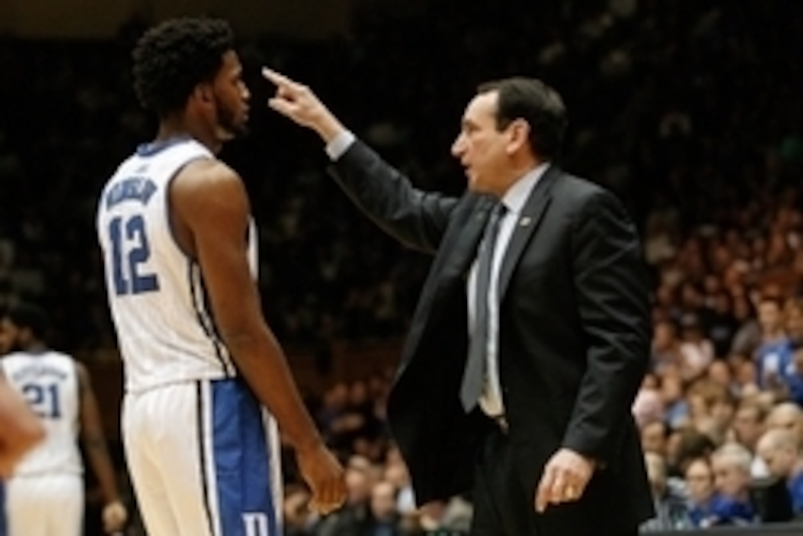 Jan 19, 2015; Durham, NC, USA; Duke Blue Devils head coach Mike Krzyzewski talks to forward Justise Winslow (12) on the sidelines in their game against the Pittsburgh Panthers at Cameron Indoor Stadium. Mandatory Credit: Mark Dolejs-USA TODAY Sports