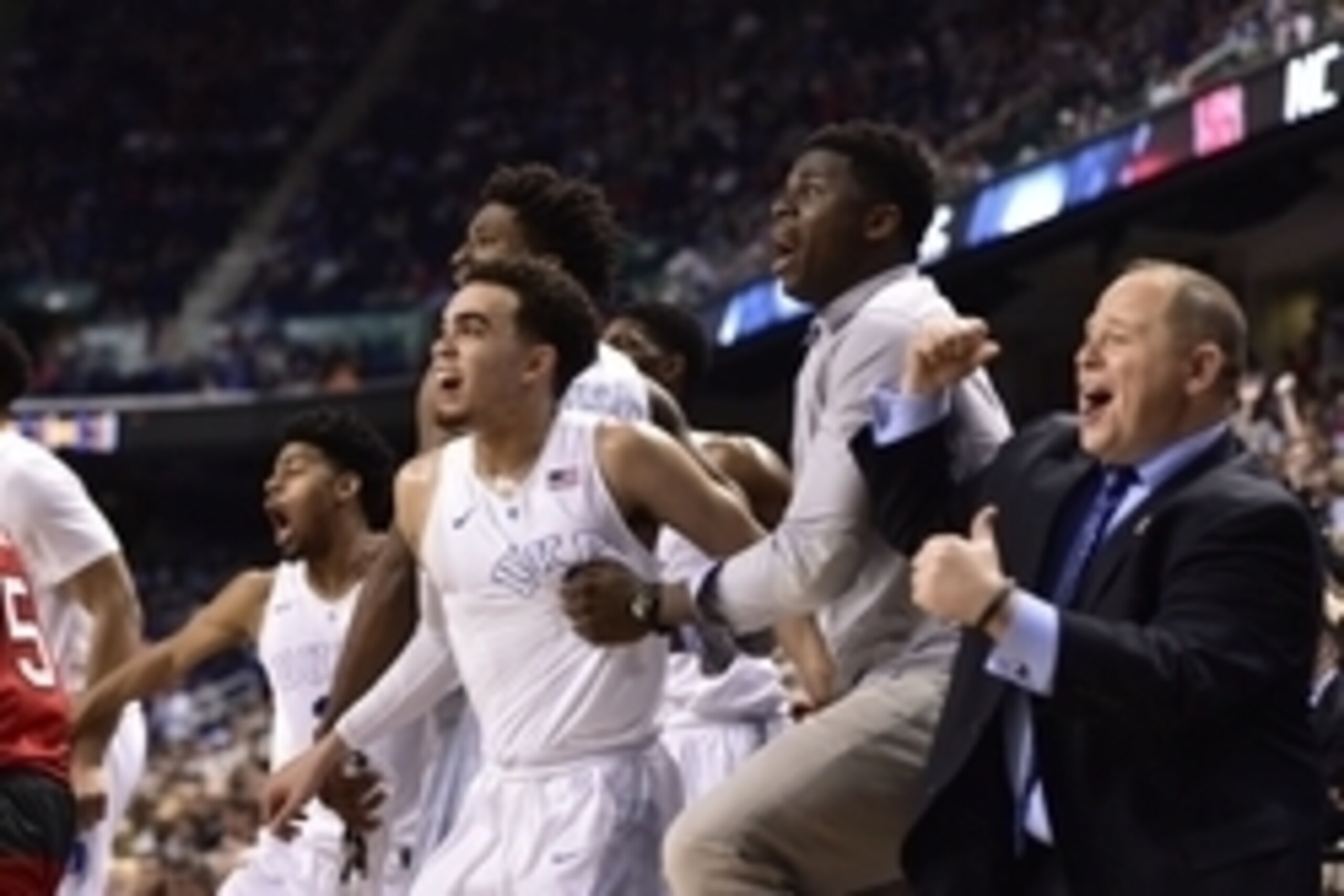 Mar 12, 2015; Greensboro, NC, USA; Duke Blue Devils bench including guard Tyus Jones (5) (middle) react toward the end of the game. The Blue Devils debated the Wolfpack 77-53 in the quarter finals of the ACC Tournament at Greensboro Coliseum. Mandatory C Mar 12, 2015; Greensboro, NC, USA; Duke Blue Devils bench including guard Tyus Jones (5) (middle) react toward the end of the game. The Blue Devils debated the Wolfpack 77-53 in the quarter finals of the ACC Tournament at Greensboro Coliseum. Mandatory C