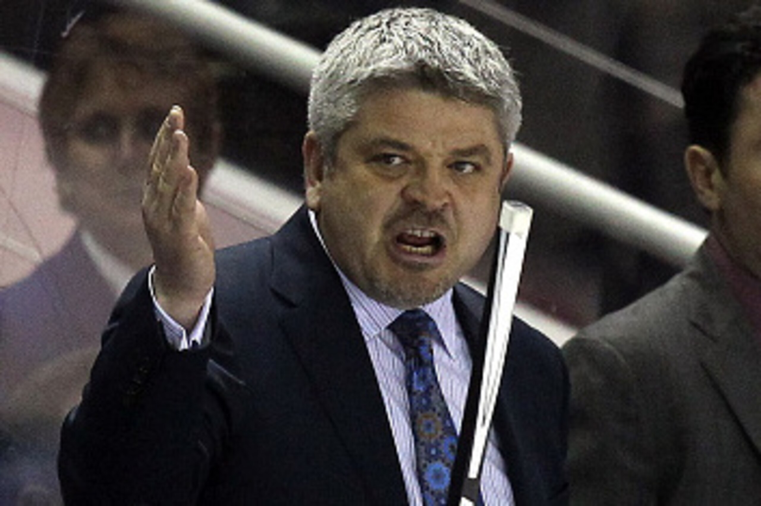SAN JOSE, CA - FEBRUARY 28:  Head coach Todd McLellan of the San Jose Sharks stands on the bench during their game against the Ottawa Senators at SAP Center on February 28, 2015 in San Jose, California.  (Photo by Ezra Shaw/Getty Images)