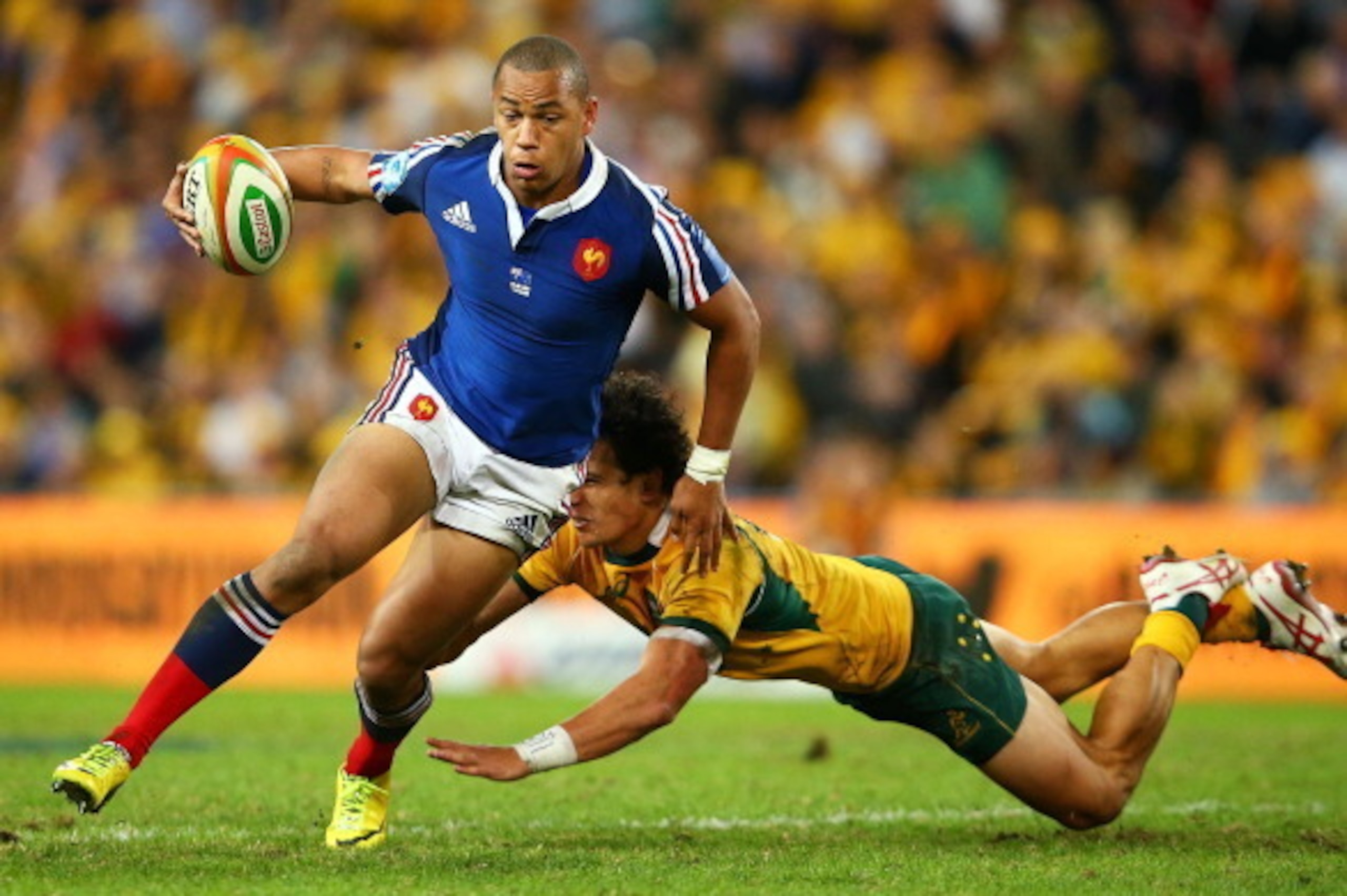 BRISBANE, AUSTRALIA - JUNE 07:  Gael Fickou of France runs the ball during the First International Test Match between the Australian Wallabies and France at Suncorp Stadium on June 7, 2014 in Brisbane, Australia.  (Photo by Mark Nolan/Getty Images)
