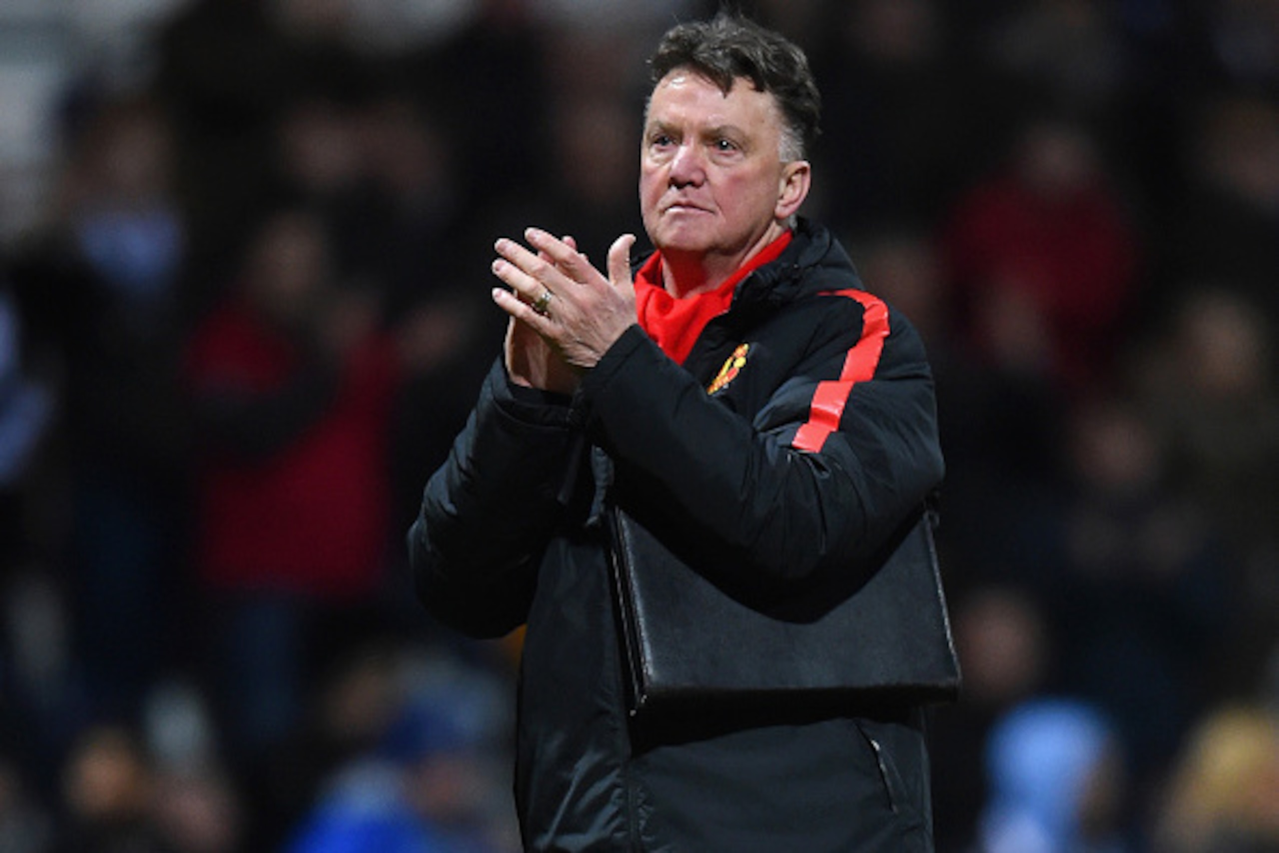 PRESTON, ENGLAND - FEBRUARY 16:  Manager Louis van Gaal of Manchester United applauds the fans during the FA Cup Fifth round match between Preston North End and Manchester United at Deepdale on February 16, 2015 in Preston, England  (Photo by Michael Rega