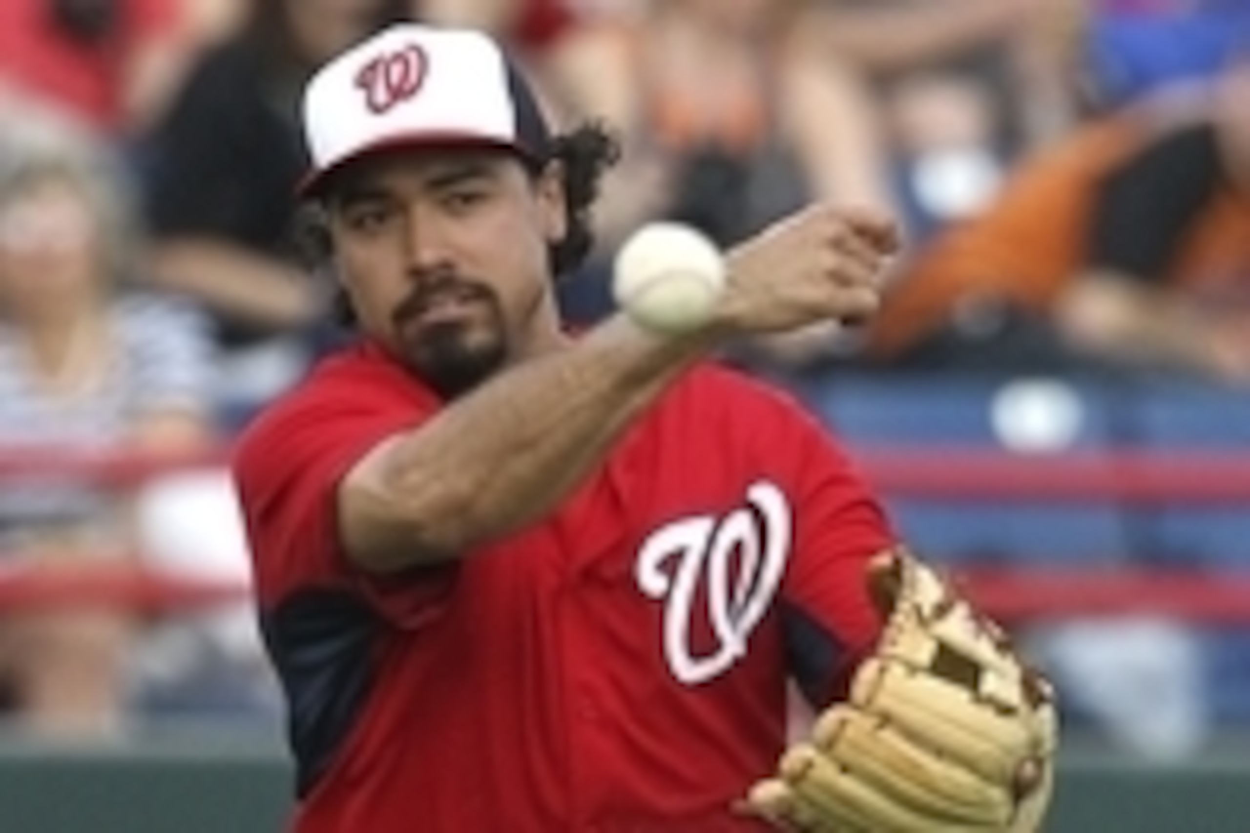 Mar 5, 2015; Melbourne, FL, USA; Washington Nationals third baseman Anthony Rendon (6) throws out New York Mets catcher Anthony Recker during the second inning of a spring training baseball game at Space Coast Stadium. Mandatory Credit: Reinhold Matay-USA