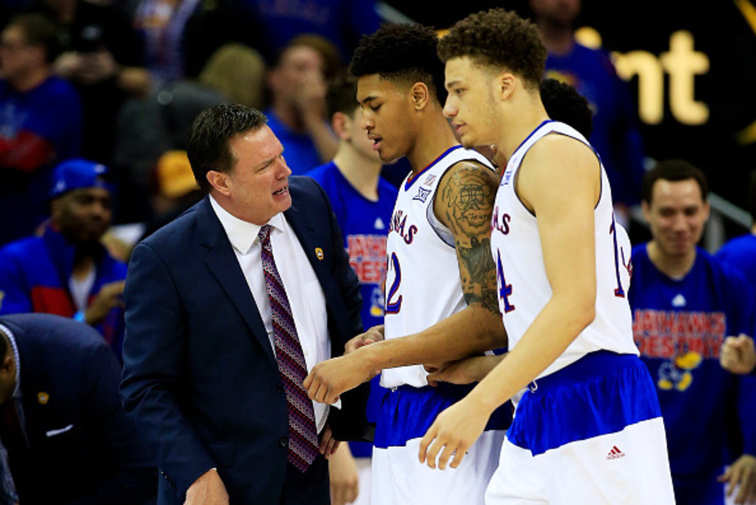 KANSAS CITY, MO - MARCH 13: Head coach Bill Self of the Kansas Jayhawks talks to Brannen Greene #14 and Kelly Oubre Jr. #12 in the second half against the Baylor Bears during a semifinal game of the 2015 Big 12 Basketball Tournament at Sprint Center on M KANSAS CITY, MO - MARCH 13: Head coach Bill Self of the Kansas Jayhawks talks to Brannen Greene #14 and Kelly Oubre Jr. #12 in the second half against the Baylor Bears during a semifinal game of the 2015 Big 12 Basketball Tournament at Sprint Center on M