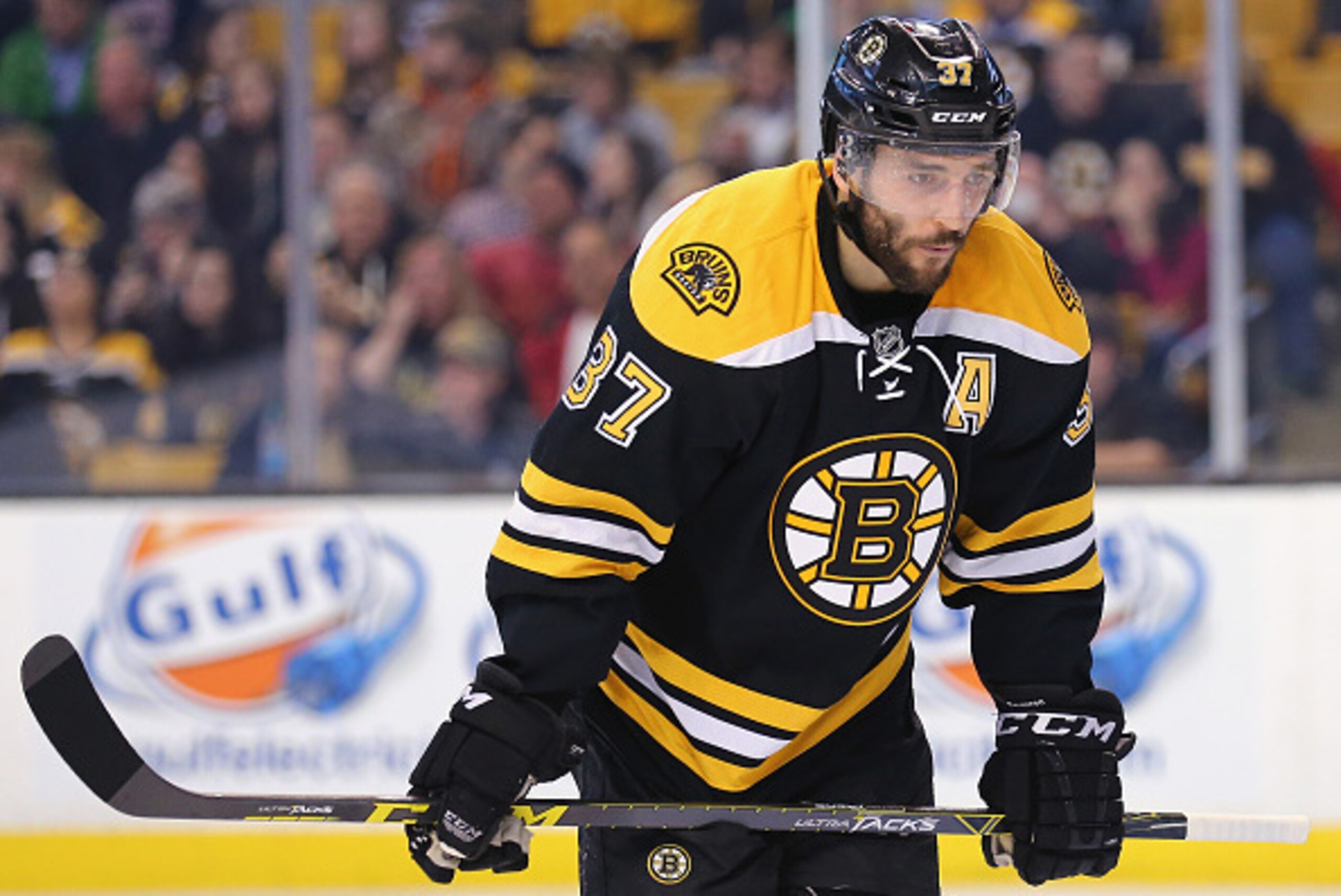 BOSTON, MA - MARCH 12:  Patrice Bergeron #37 of the Boston Bruins looks on during the second period against the Tampa Bay Lightning at TD Garden on March 12, 2015 in Boston, Massachusetts.  (Photo by Maddie Meyer/Getty Images)