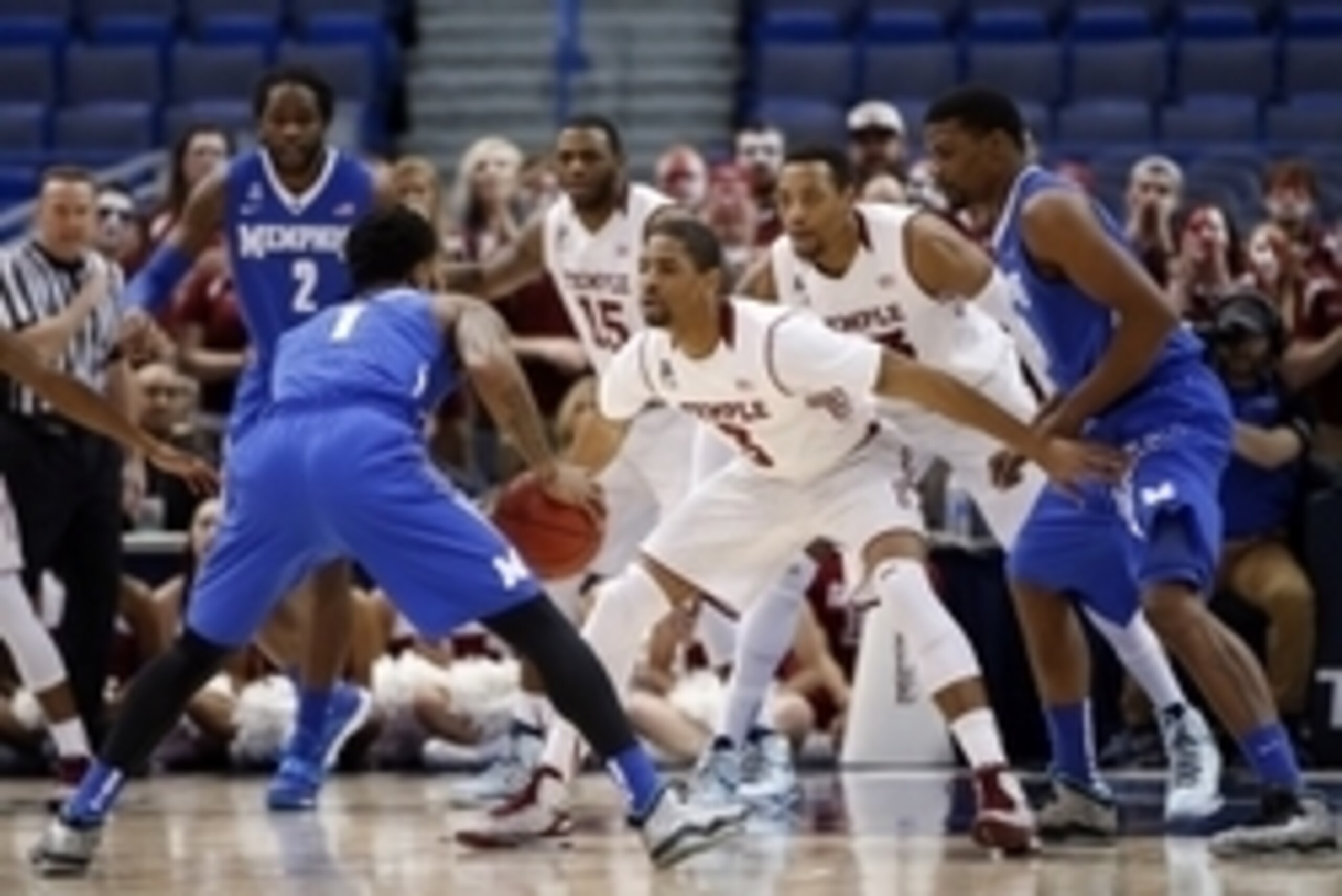 Mar 13, 2015; Hartford, CT, USA; Temple Owls guard Jesse Morgan (3) defends against Memphis Tigers guard Markel Crawford (1) in the first half during the quarterfinal round of the American Conference Tournament at XL Center. Mandatory Credit: David Butler