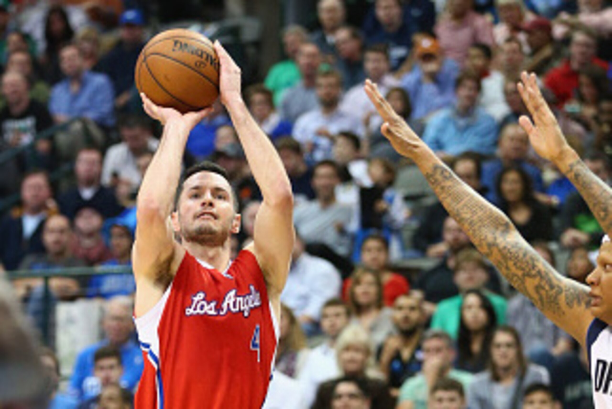 DALLAS, TX - MARCH 13:  J.J. Redick #4 of the Los Angeles Clippers takes a shot against the Dallas Mavericks at American Airlines Center on March 13, 2015 in Dallas, Texas.   NOTE TO USER: User expressly acknowledges and agrees that, by downloading and or