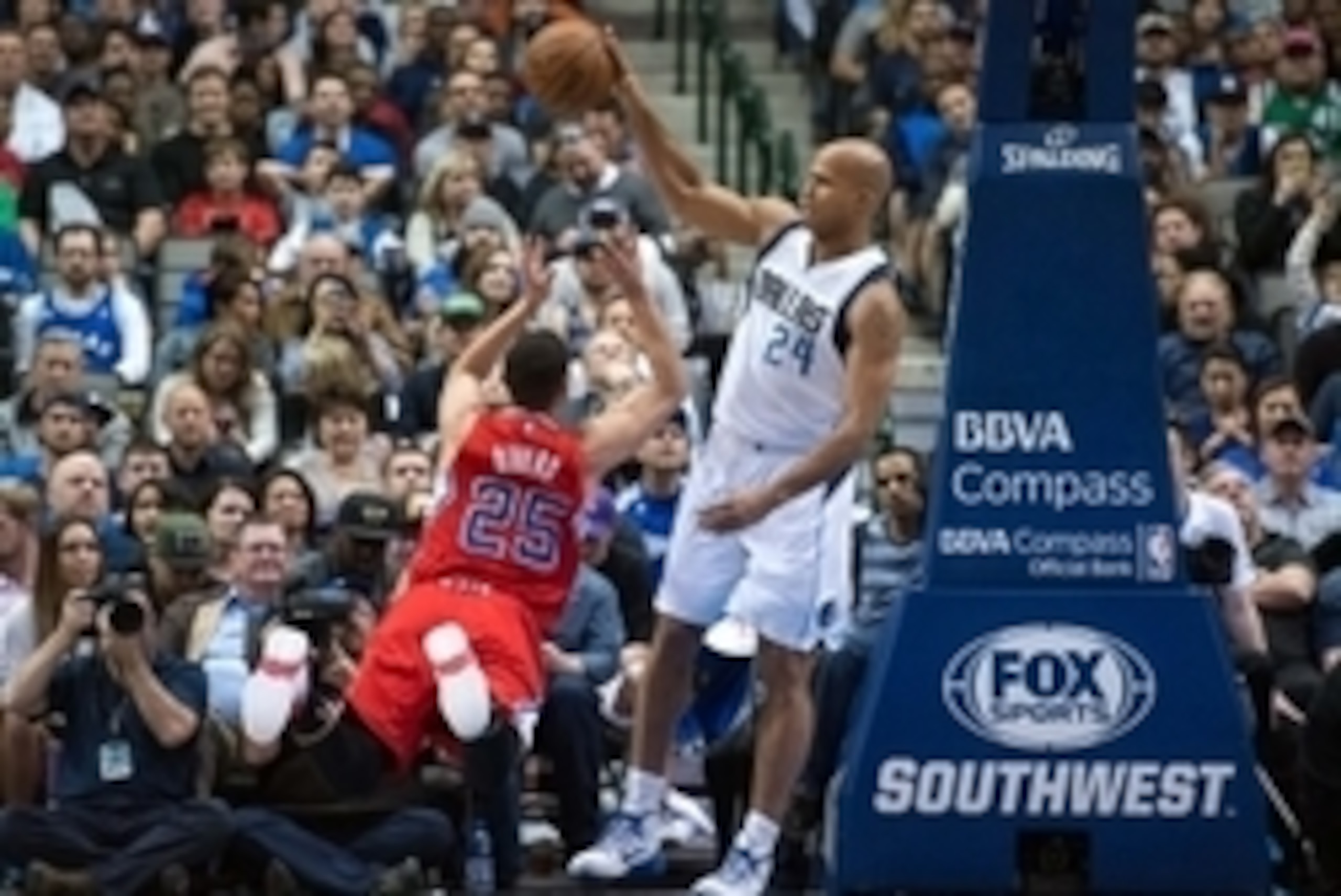 Mar 13, 2015; Dallas, TX, USA; Dallas Mavericks forward Richard Jefferson (24) steals the ball from Los Angeles Clippers guard Austin Rivers (25) during the second quarter at the American Airlines Center. Mandatory Credit: Jerome Miron-USA TODAY Sports