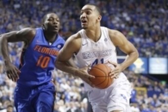 Mar 7, 2015; Lexington, KY, USA; Kentucky Wildcats forward Trey Lyles (41) dribbles the ball against Florida Gators forward Dorian Finney-Smith (10) in the first half at Rupp Arena. Mandatory Credit: Mark Zerof-USA TODAY Sports