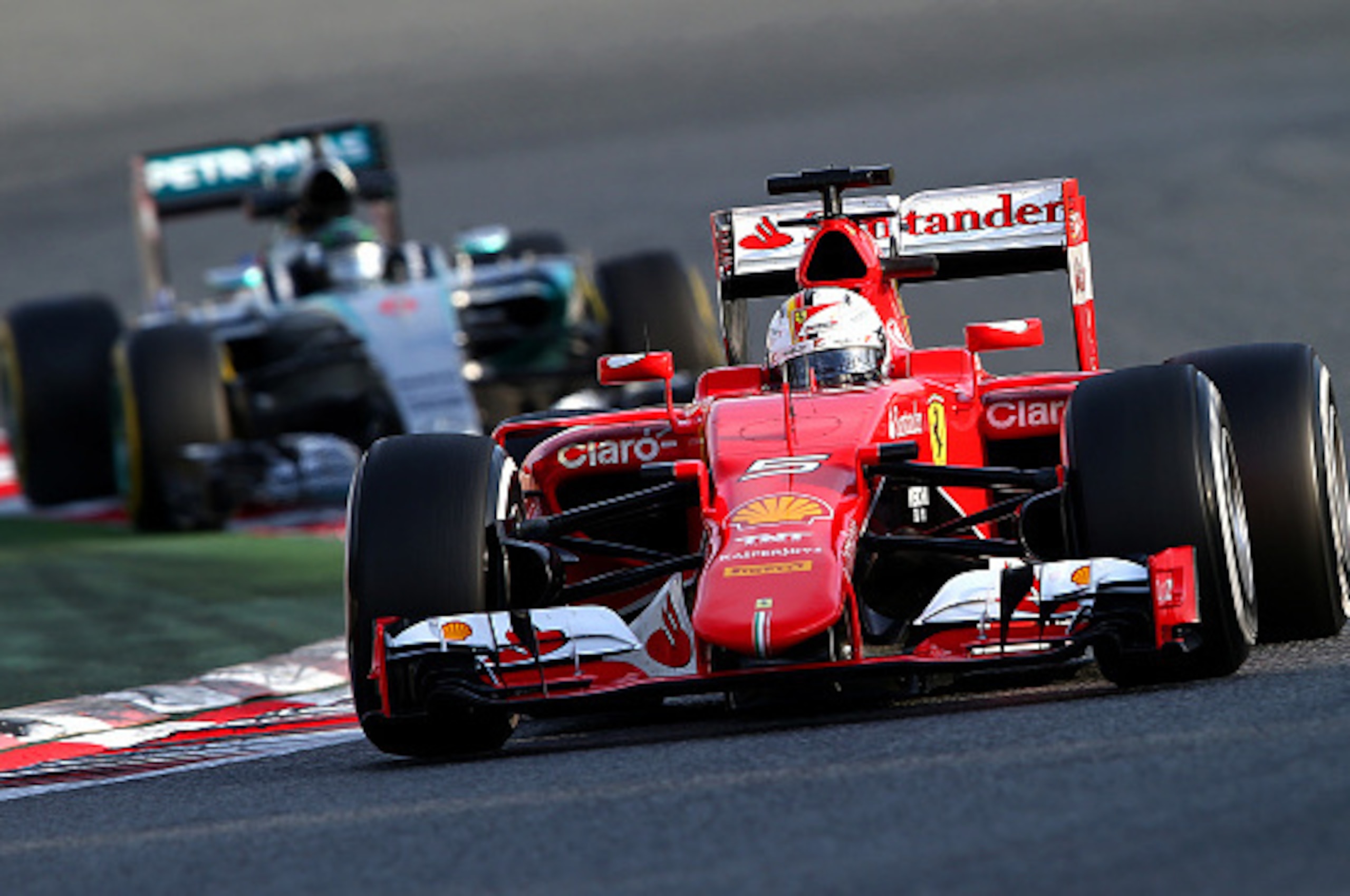MONTMELO, SPAIN - MARCH 01: Nico Rosberg of Germany and Mercedes GP follows Sebastian Vettel of Germany and Ferrari during day four of the final Formula One Winter Testing at Circuit de Catalunya on March 1, 2015 in Montmelo, Spain. (Photo by Mark Thomp MONTMELO, SPAIN - MARCH 01: Nico Rosberg of Germany and Mercedes GP follows Sebastian Vettel of Germany and Ferrari during day four of the final Formula One Winter Testing at Circuit de Catalunya on March 1, 2015 in Montmelo, Spain. (Photo by Mark Thomp