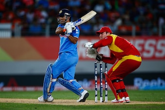 AUCKLAND, NEW ZEALAND - MARCH 14:  MS Dhoni of India bats during the 2015 ICC Cricket World Cup match between India and Zimbabwe at Eden Park on March 14, 2015 in Auckland, New Zealand.  (Photo by Phil Walter/Getty Images)