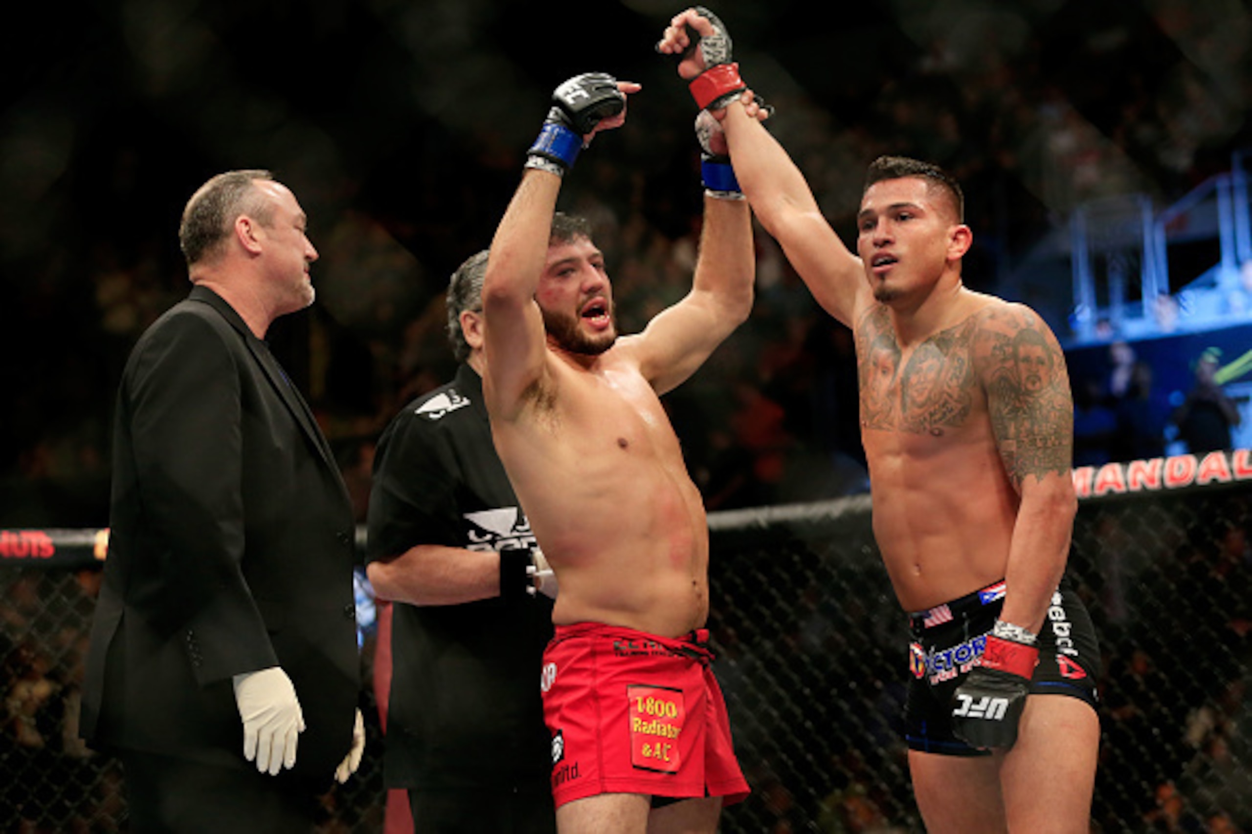 LAS VEGAS, NV - DECEMBER 06:  Anthony Pettis reacts after defeating Gilbert Menendez in their lightweight title fight during the UFC 181 event at the Mandalay Bay Events Center on December 6, 2014 in Las Vegas, Nevada.  (Photo by Alex Trautwig/Getty Image