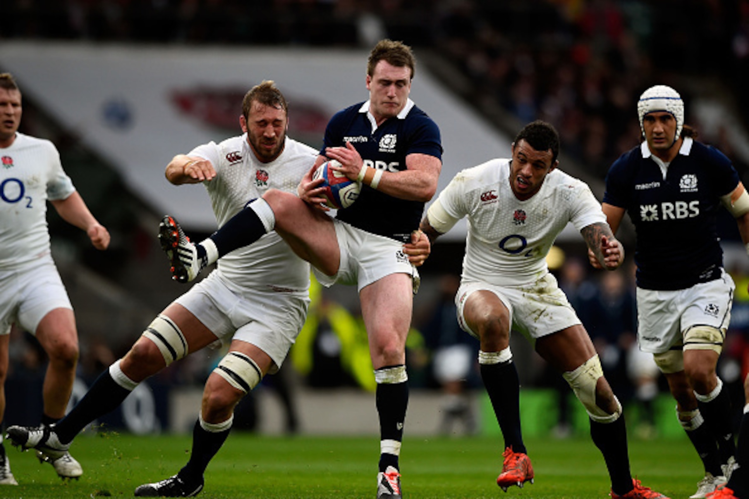 LONDON, ENGLAND - MARCH 14:  Stuart Hogg of Scotland is tackled by Chris Robshaw of England and Courtney Lawes of England during the RBS Six Nations match between England and Scotland at Twickenham Stadium on March 14, 2015 in London, England.  (Photo by 