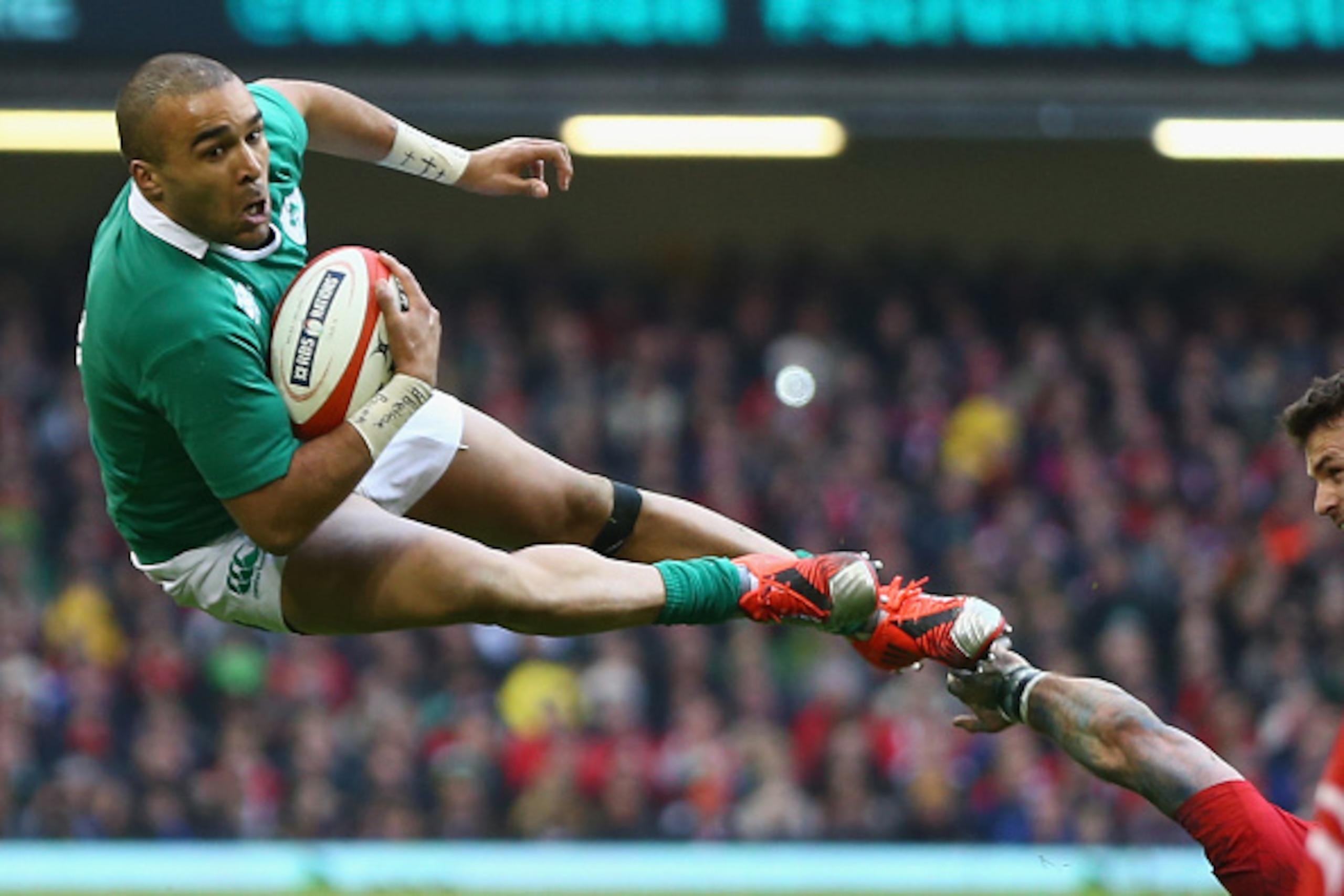 CARDIFF, WALES - MARCH 14:  Simon Zebo of Ireland is upended during the RBS Six Nations match between Wales and Ireland at the Millennium Stadium on March 14, 2015 in Cardiff, Wales.  (Photo by Michael Steele/Getty Images)