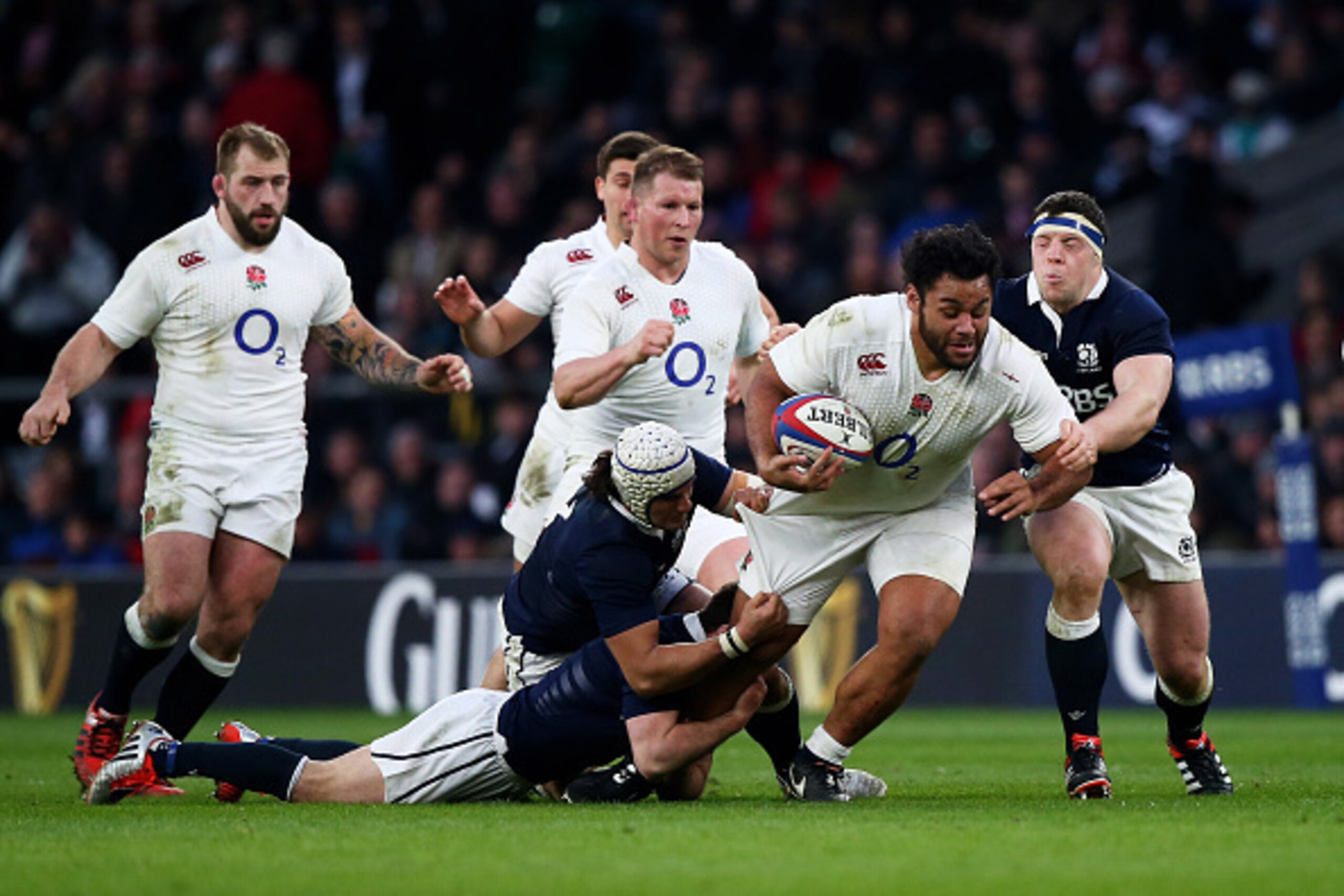 LONDON, ENGLAND - MARCH 14:  Billy Vunipola of England is hauled down by the scottish defence during the RBS Six Nations match between England and Scotland at Twickenham Stadium on March 14, 2015 in London, England.  (Photo by Clive Rose/Getty Images)