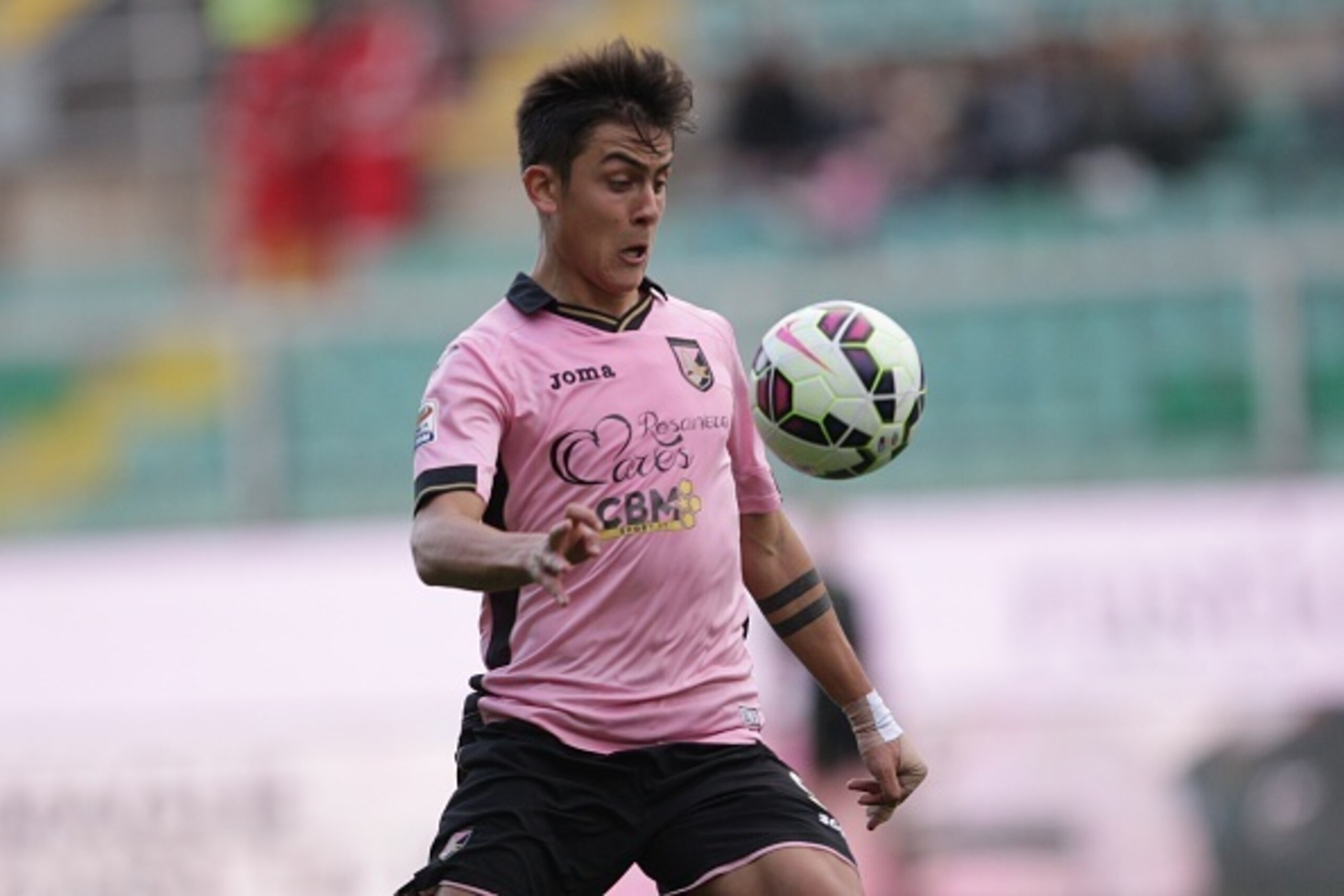 PALERMO, ITALY - MARCH 01:  Paulo Dybala in action during the Serie A match between US Citta di Palermo and Empoli FC at Stadio Renzo Barbera on March 1, 2015 in Palermo, Italy.  (Photo by Tullio M. Puglia/Getty Images)
