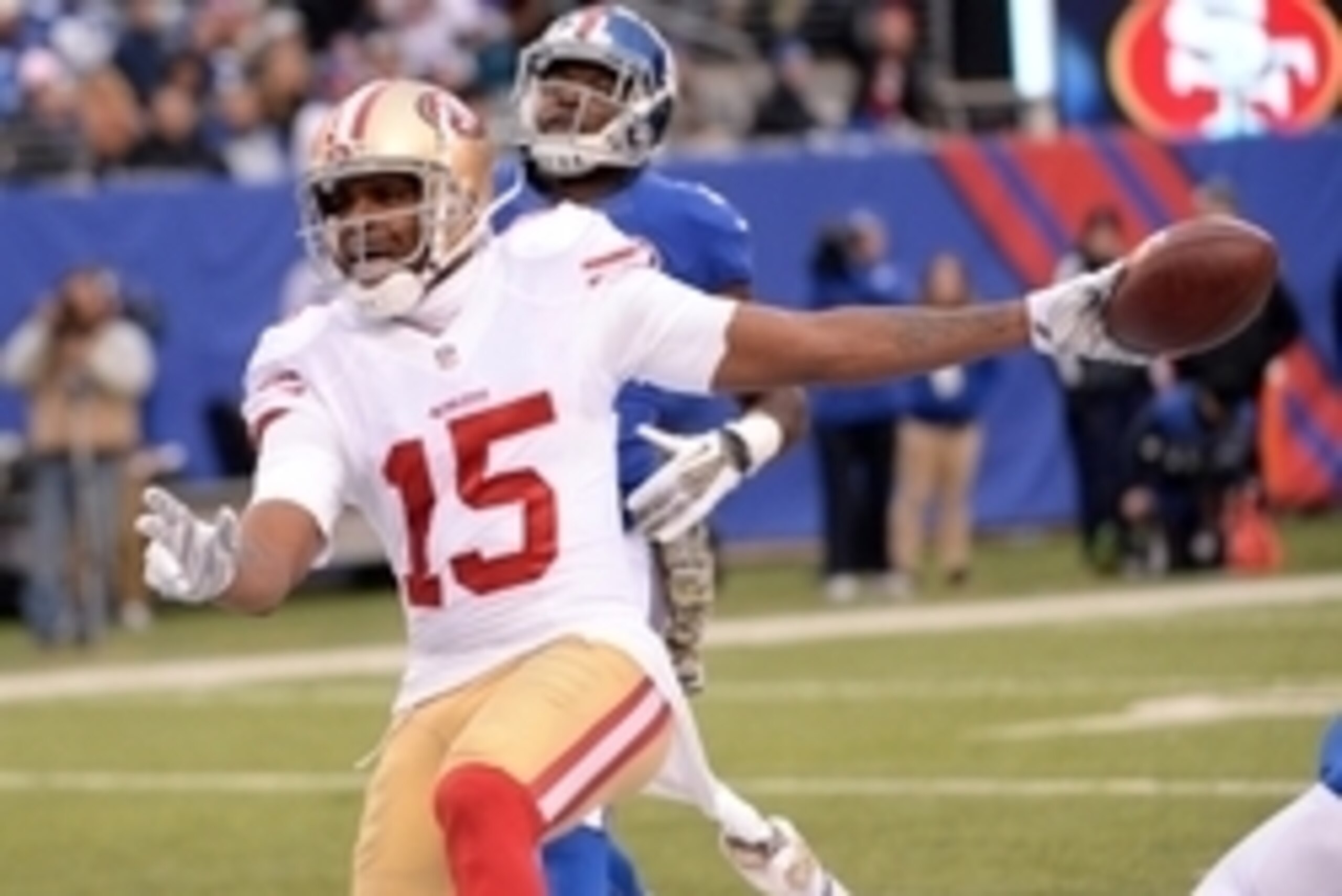 Nov 16, 2014; East Rutherford, NJ, USA; San Francisco 49ers wide receiver Michael Crabtree (15) scores the game winning touchdown during the second half against the New York Giantsat MetLife Stadium. Mandatory Credit: Robert Deutsch-USA TODAY Sports