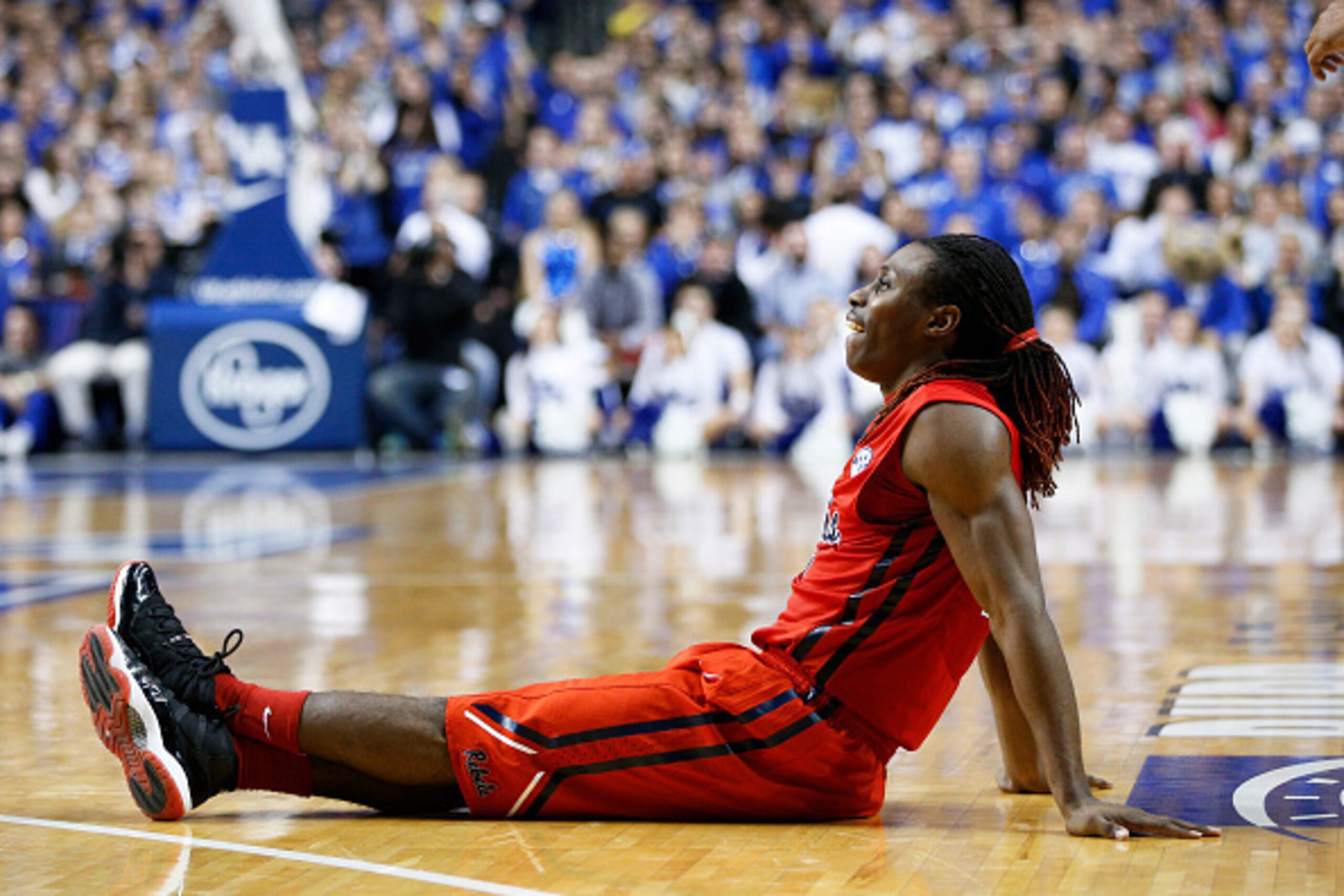 LEXINGTON, KY - JANUARY 6: Stefan Moody #42 of the Mississippi Rebels reacts after cramping up in the second half of the game against the Kentucky Wildcats at Rupp Arena on January 6, 2015 in Lexington, Kentucky. Kentucky defeated Mississippi 89-86 in ove