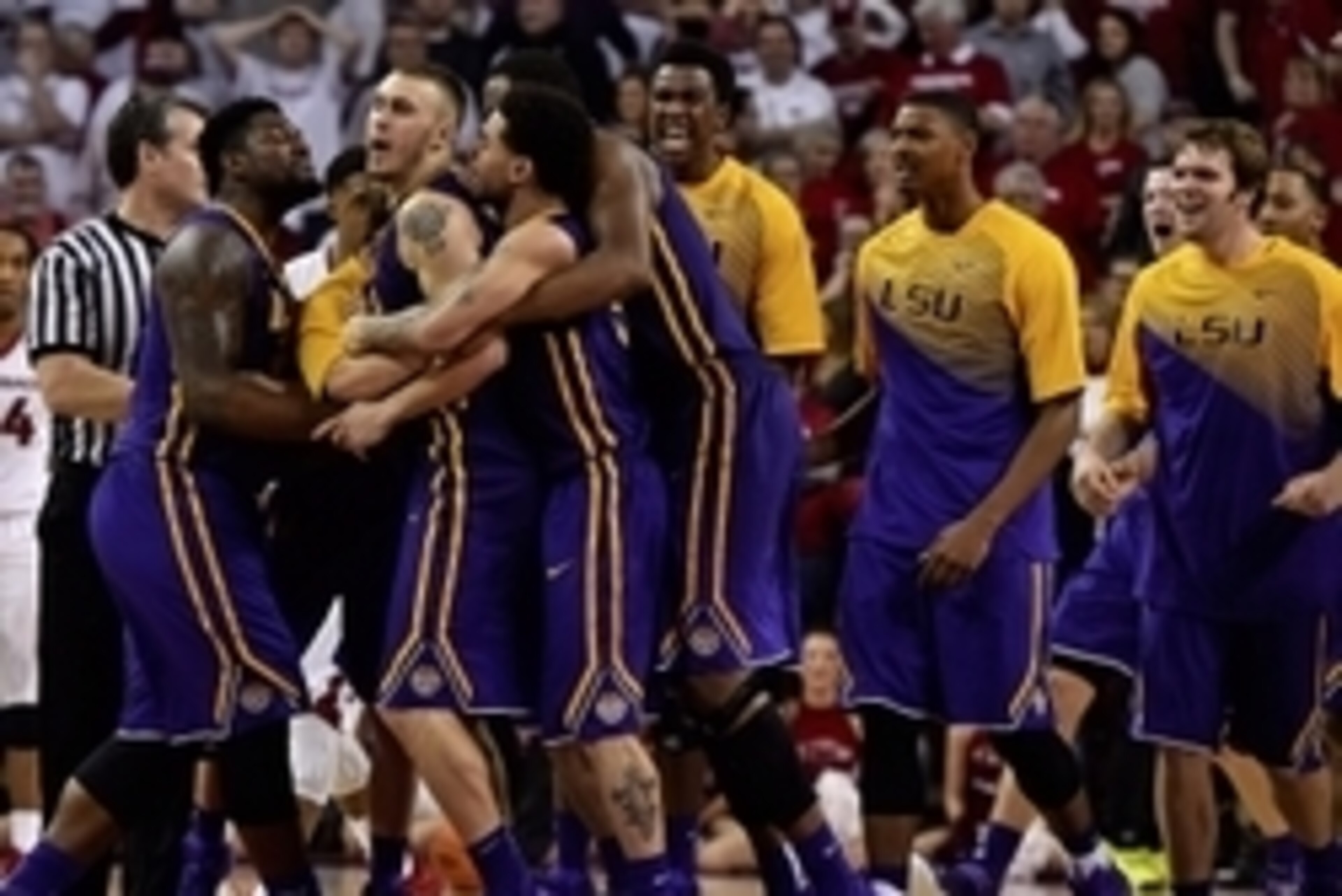 Mar 7, 2015; Fayetteville, AR, USA; LSU Tigers guard Keith Hornsby (center) celebrates with teammates after defeating the Arkansas Razorbacks at Bud Walton Arena. LSU won 81-78. Mandatory Credit: Jasen Vinlove-USA TODAY Sports