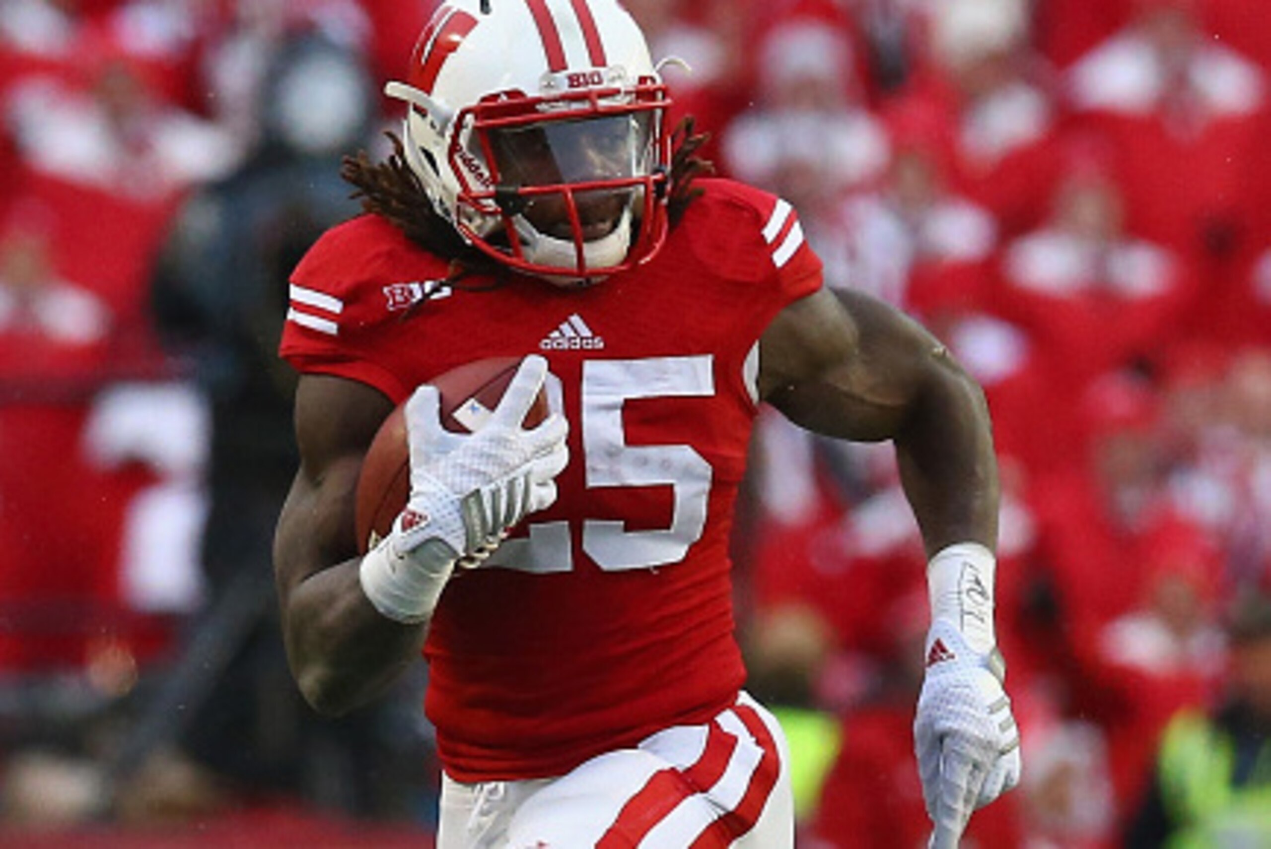 Melvin Gordon #25 of the Wisconsin Badgers runs against the Nebraska Cornhuskers at Camp Randall Stadium on November 15, 2014 in Madison, Wisconsin.