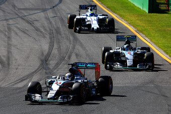 MELBOURNE, AUSTRALIA - MARCH 15:  Lewis Hamilton of Great Britain and Mercedes GP leads Nico Rosberg of Germany and Mercedes GP and Felipe Massa of Brazil and Williams during the Australian Formula One Grand Prix at Albert Park on March 15, 2015 in Melbou
