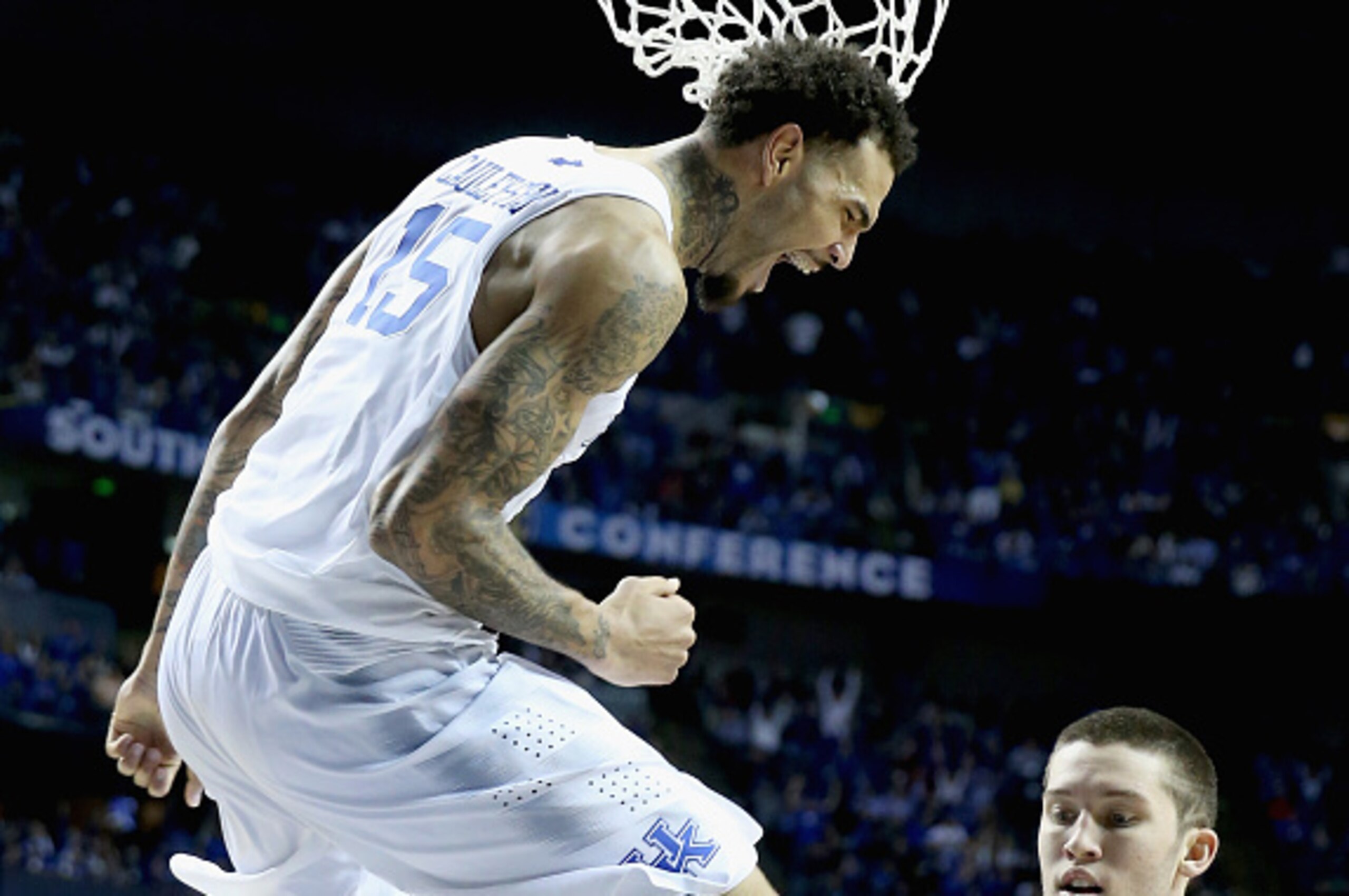 NASHVILLE, TN - MARCH 14:  Willie Cauley-Stien #15 of the Kentucky Wildcats celebrates after dunking the ball against the Auburn Tigers during the SEC Basketball Tournament Semifinals at Bridgestone Arena on March 14, 2015 in Nashville, Tennessee.  (Photo