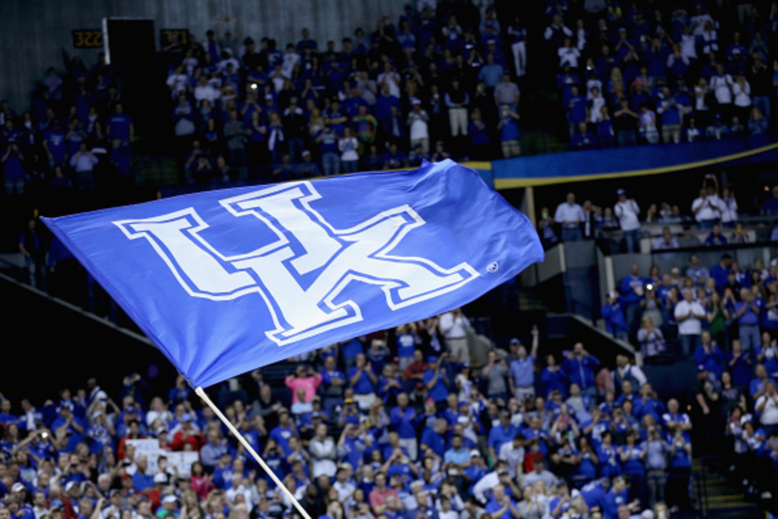 NASHVILLE, TN - MARCH 15:  A Kentucky Wildcats flag flies is waved before the game against the Arkansas Razorbacks in the championship game of the SEC Basketball Tournament at Bridgestone Arena on March 15, 2015 in Nashville, Tennessee.  (Photo by Andy Ly