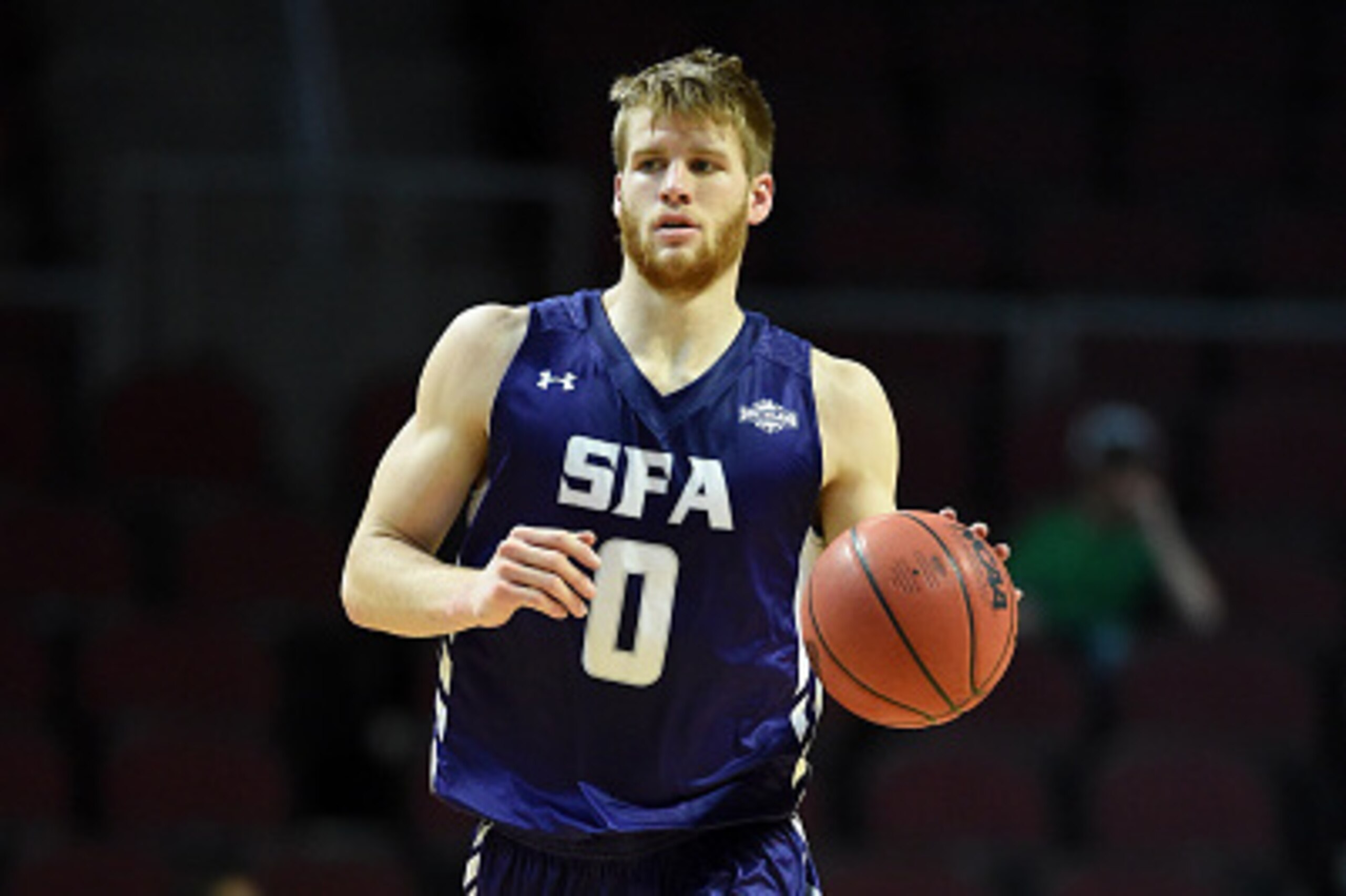 LAS VEGAS, NV - NOVEMBER 28:  Thomas Walkup #0 of the Stephen F. Austin Lumberjacks brings the ball up the court against the Austin Peay Governors during the 2014 Continental Tire Las Vegas Invitational basketball tournament at the Orleans Arena on Novemb