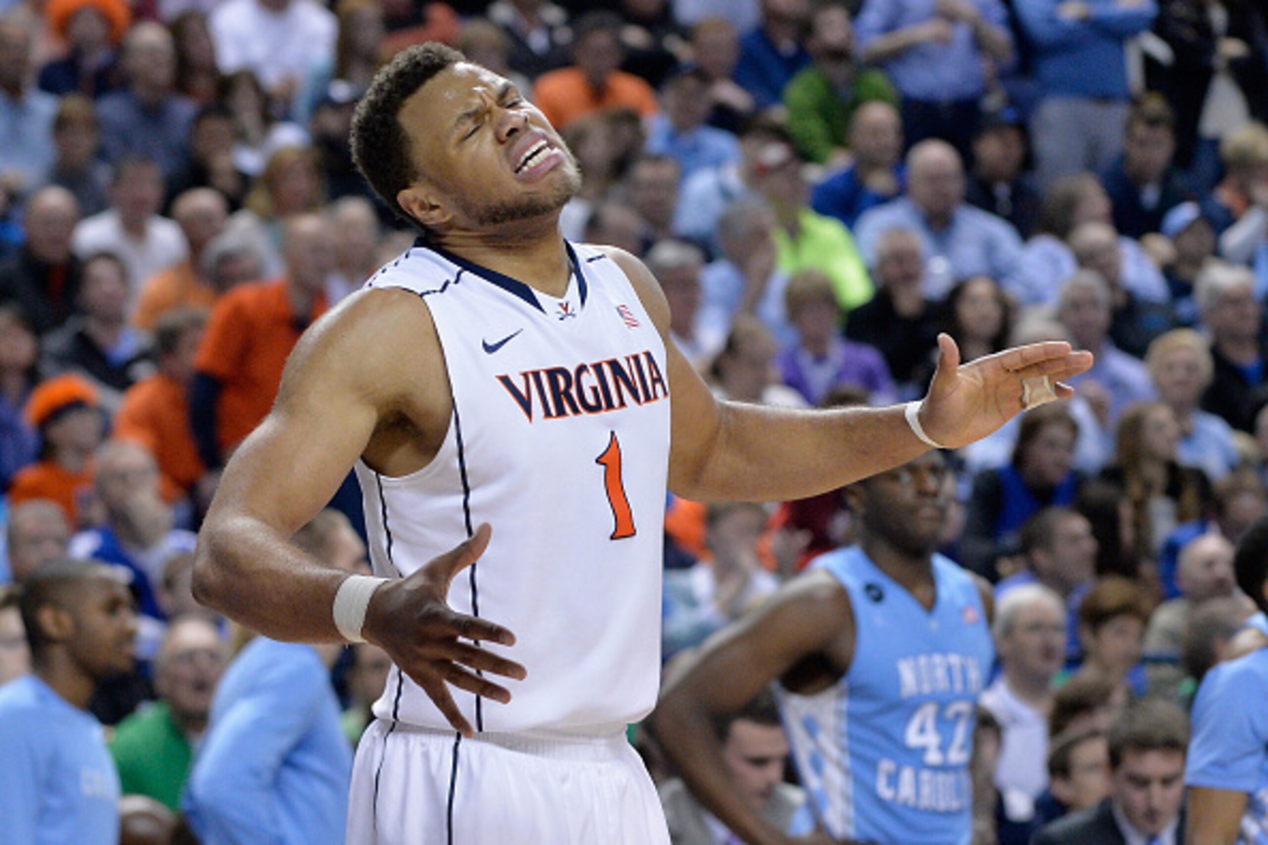 GREENSBORO, NC - MARCH 13:  Justin Anderson #1 of the Virginia Cavaliers reacts after a play against the North Carolina Tar Heels during the semifinals of the 2015 ACC Basketball Tournament at Greensboro Coliseum on March 13, 2015 in Greensboro, North Car