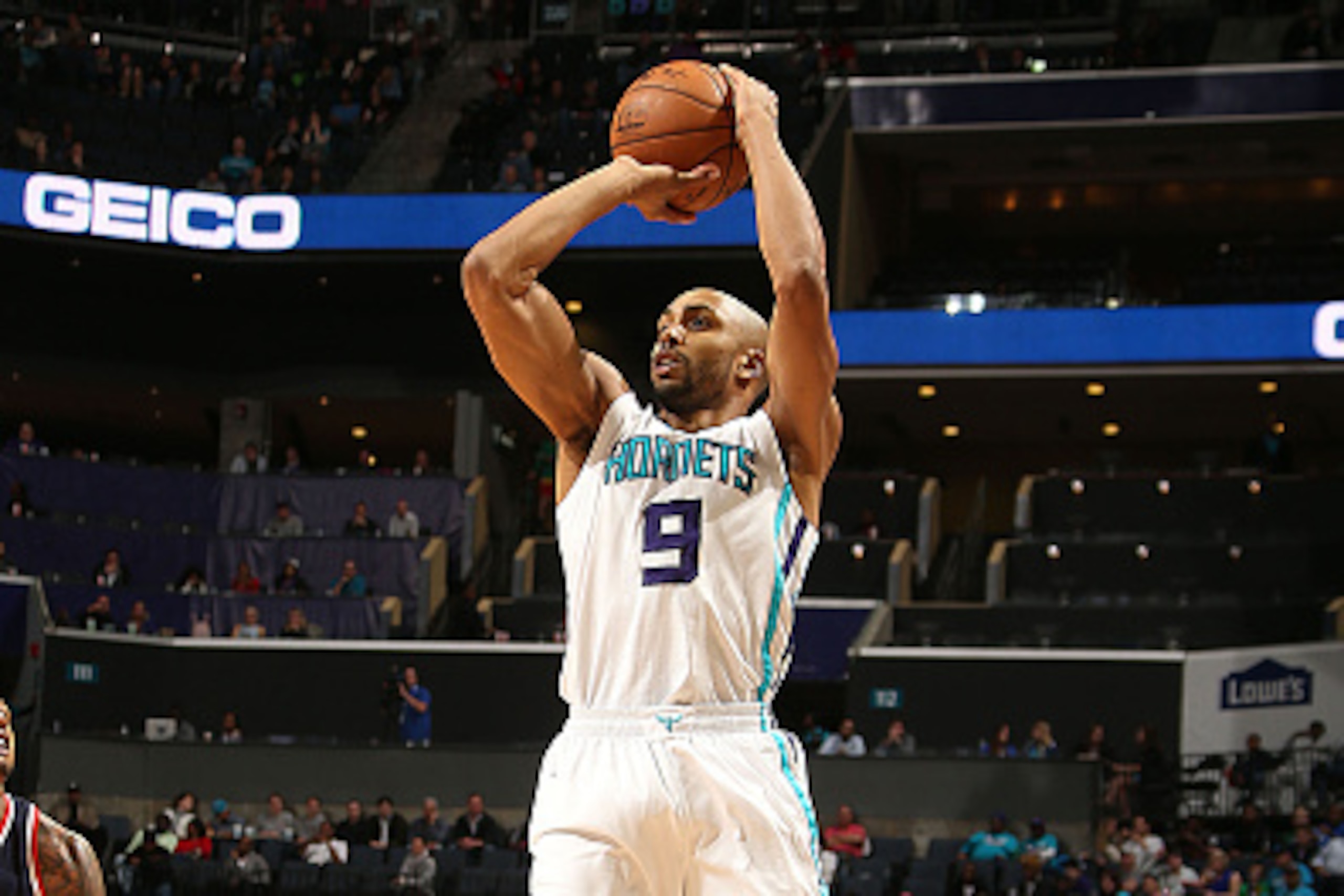 CHARLOTTE, NC - MARCH 9:  Gerald Henderson #9 of the Charlotte Hornets shoots against the Washington Wizards during the game at the Time Warner Cable Arena on March 9, 2015 in Charlotte, North Carolina. NOTE TO USER: User expressly acknowledges and agrees