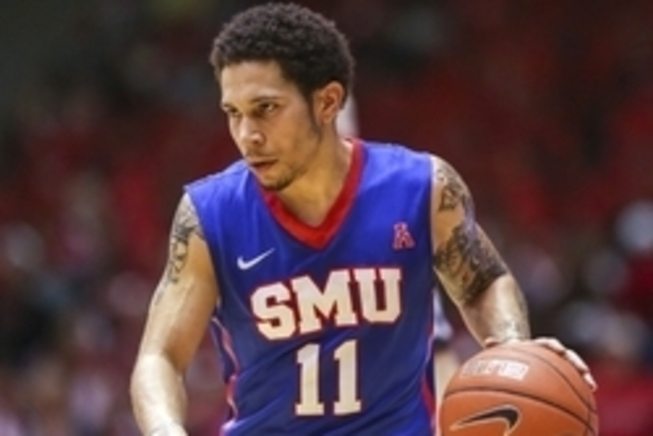 Feb 12, 2015; Houston, TX, USA; Southern Methodist Mustangs guard Nic Moore (11) brings the ball up the court during the first half against the Houston Cougars at Hofheinz Pavilion. Mandatory Credit: Troy Taormina-USA TODAY Sports