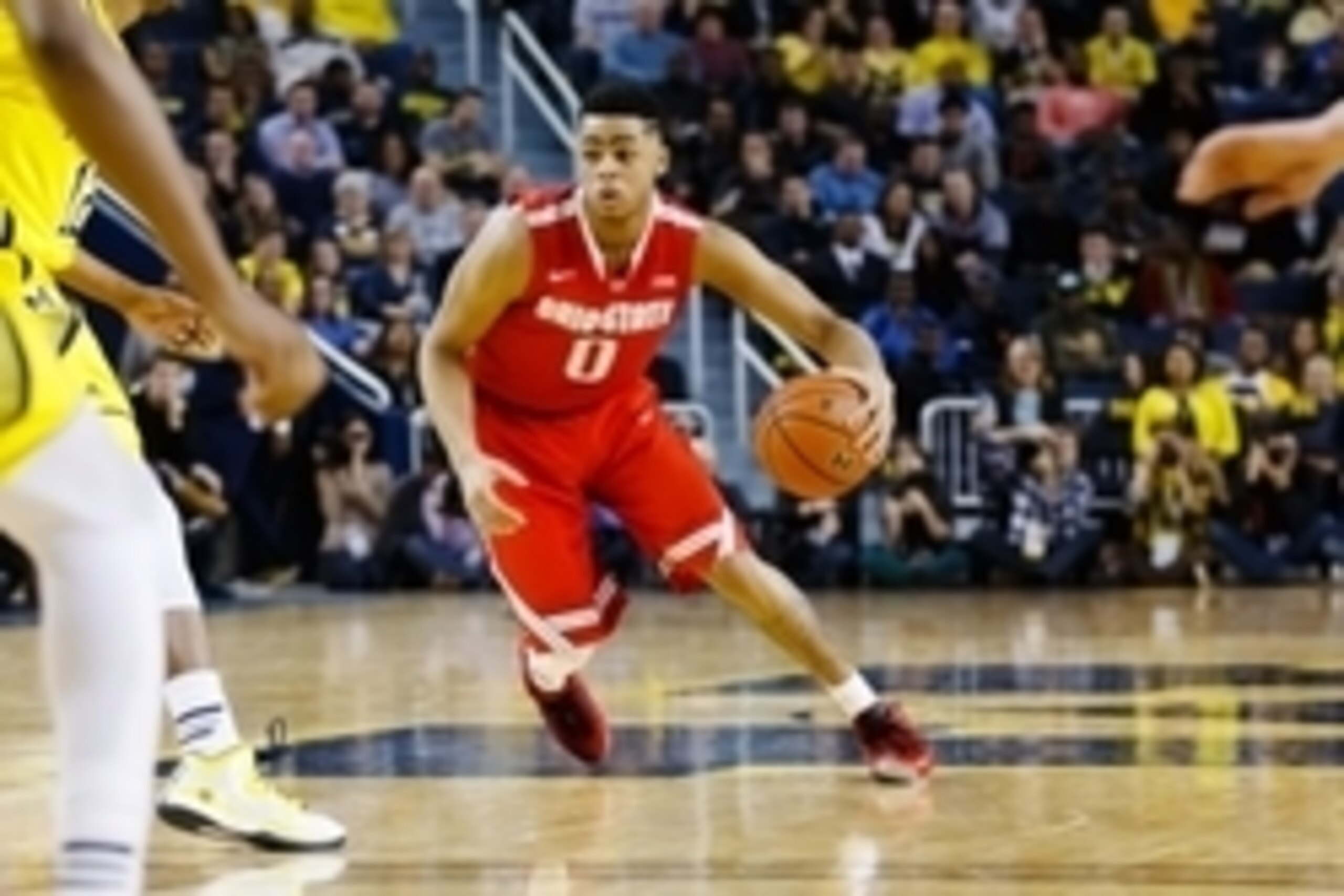 Feb 22, 2015; Ann Arbor, MI, USA; Ohio State Buckeyes guard D'Angelo Russell (0) dribbles down the court in the second half against the Michigan Wolverines at Crisler Center. Mandatory Credit: Rick Osentoski-USA TODAY Sports
