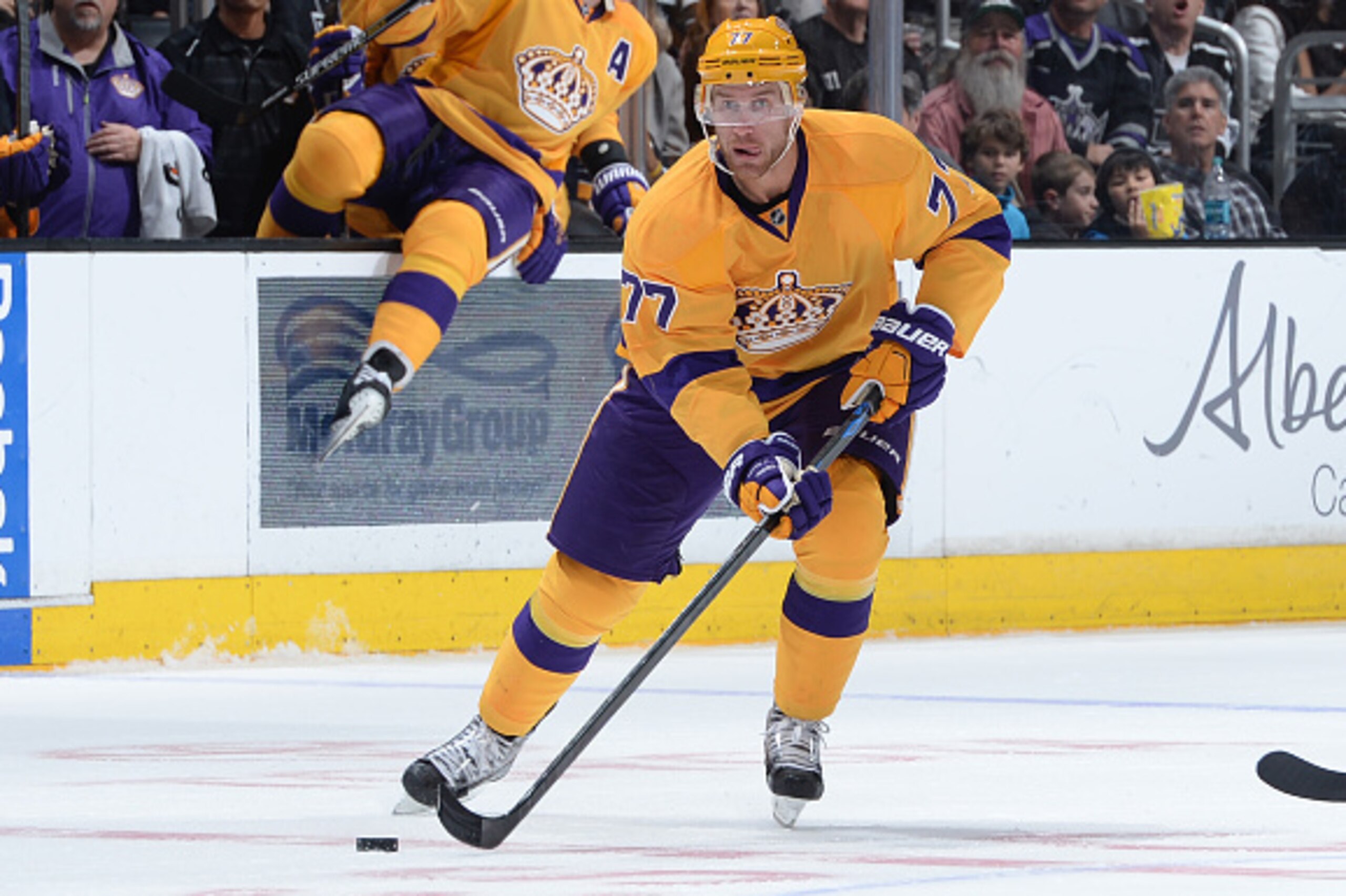 LOS ANGELES, CA - MARCH 07: Jeff Carter #77 of the Los Angeles Kings handles the puck during a game against the Pittsburgh Penguins at STAPLES Center on March 07, 2015 in Los Angeles, California. (Photo by Andrew D. Bernstein/NHLI via Getty Images)
