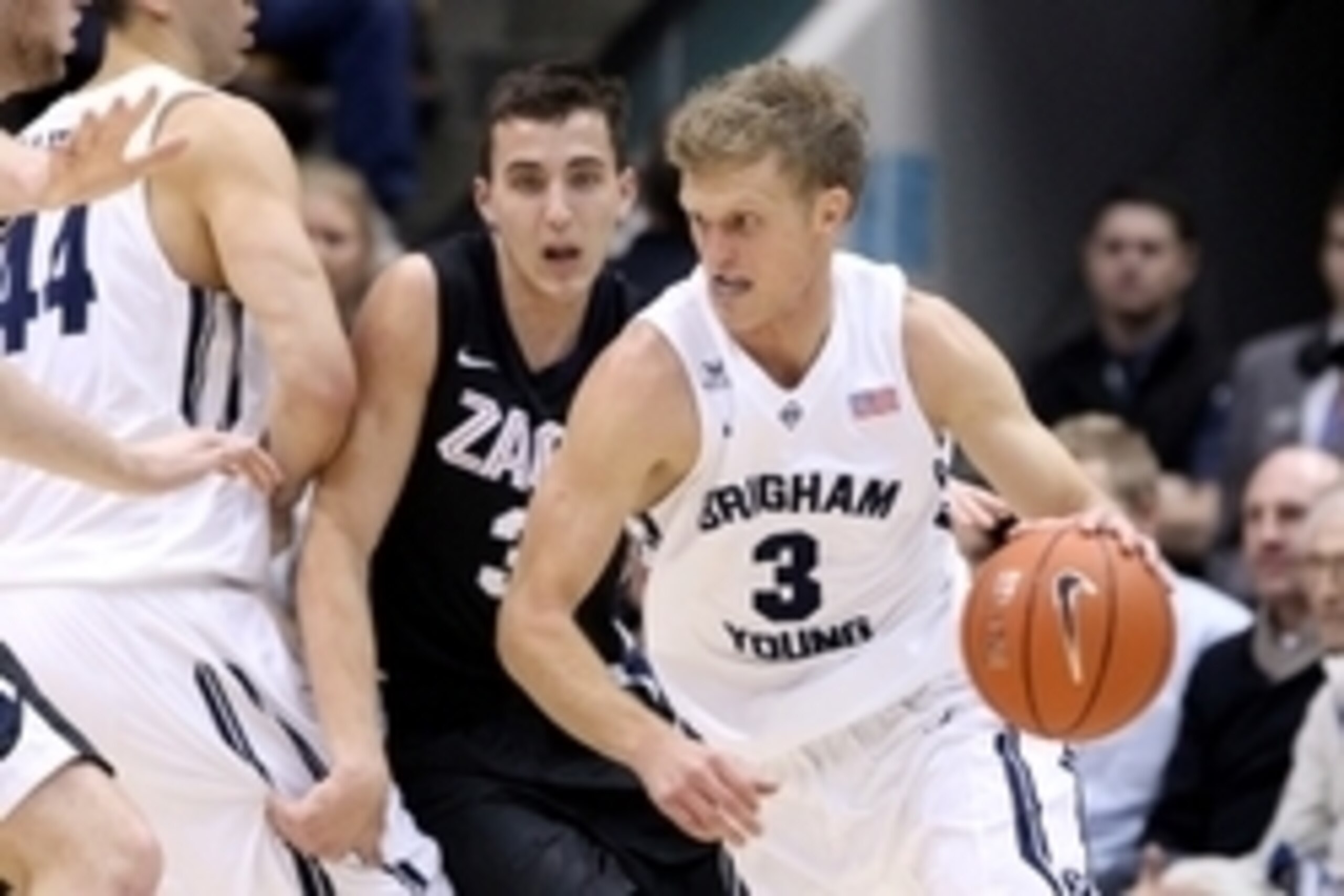 Dec 27, 2014; Provo, UT, USA; Brigham Young Cougars guard Tyler Haws (3) dribbles the ball as Gonzaga Bulldogs guard Kyle Dranginis (3) chases during the second half at Marriott Center. The Bulldogs won 87-80. Mandatory Credit: Chris Nicoll-USA TODAY Spor