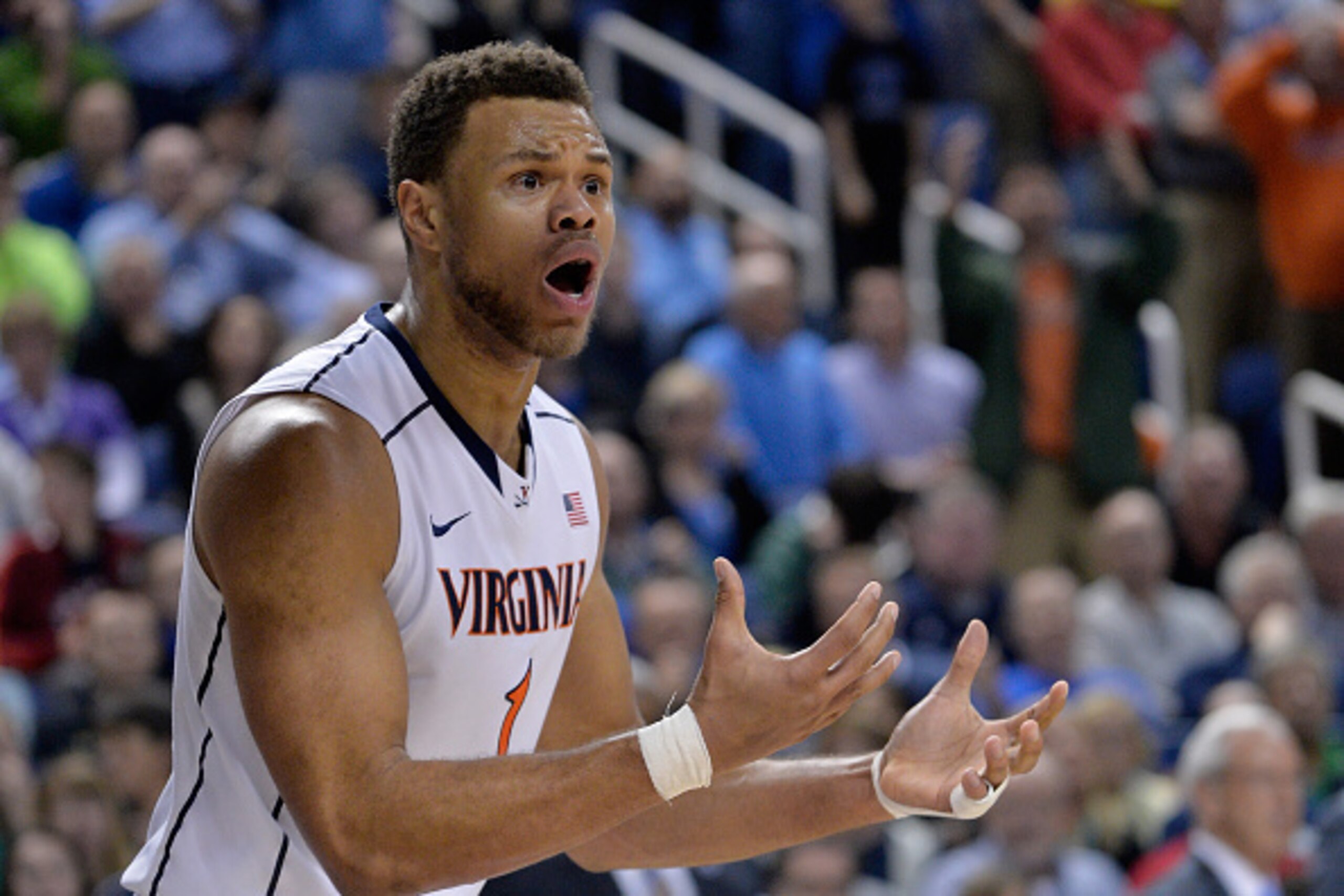 GREENSBORO, NC - MARCH 13:  Justin Anderson #1 of the Virginia Cavaliers reacts after a play against the North Carolina Tar Heels during the semifinals of the 2015 ACC Basketball Tournament at Greensboro Coliseum on March 13, 2015 in Greensboro, North Car
