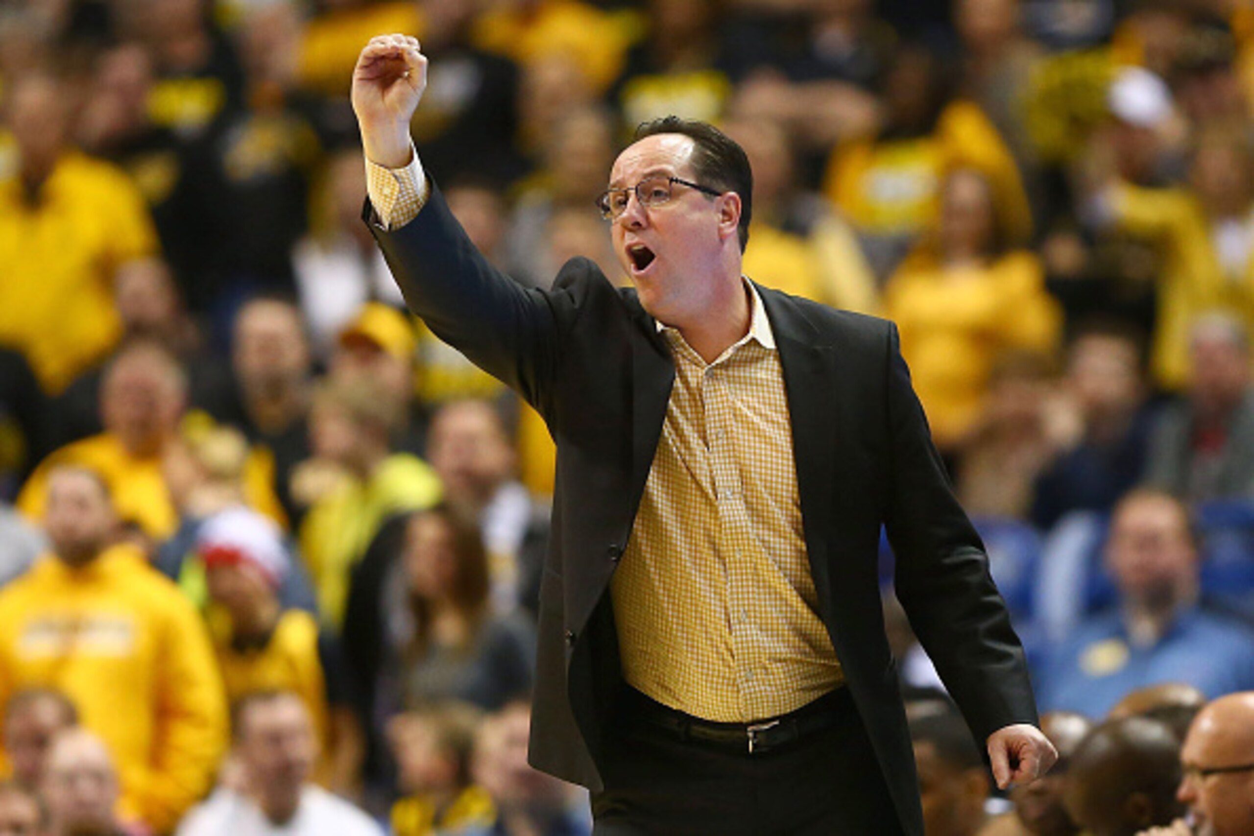 ST. LOUIS, MO - MARCH 7: Head coach Gregg Marshall of the Wichita State Shockers directs his team against the Illinois State Redbirds during the MVC Basketball Tournament Semifinals at the Scottrade Center on March 7, 2015 in St. Louis, Missouri.  (Photo 