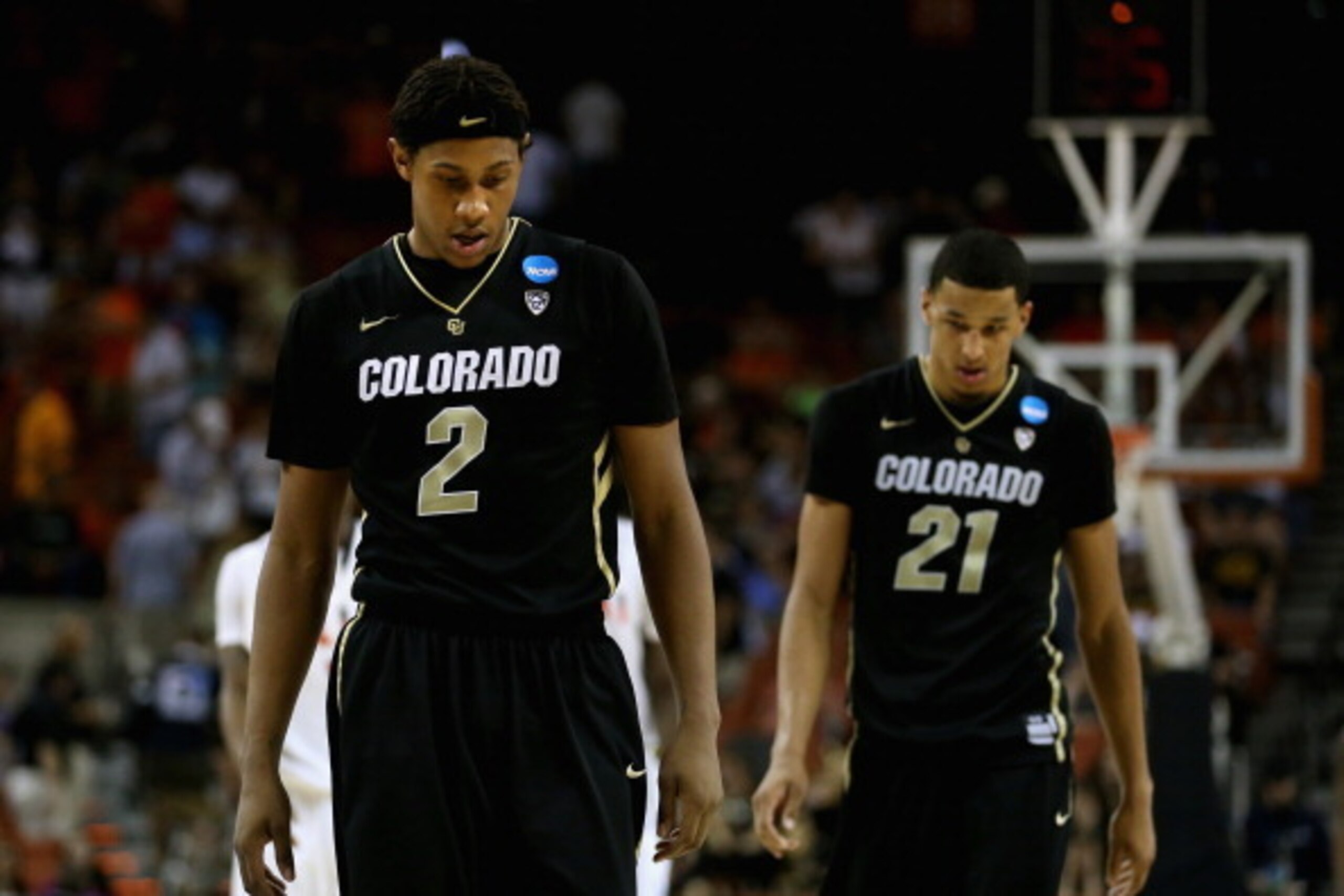 AUSTIN, TX - MARCH 22: Xavier Johnson #2 and Andre Roberson #21 of the Colorado Buffaloes walk on the court in the final minutes of the game against the Illinois Fighting Illini during the second round of the 2013 NCAA Men's Basketball Tournament at The F