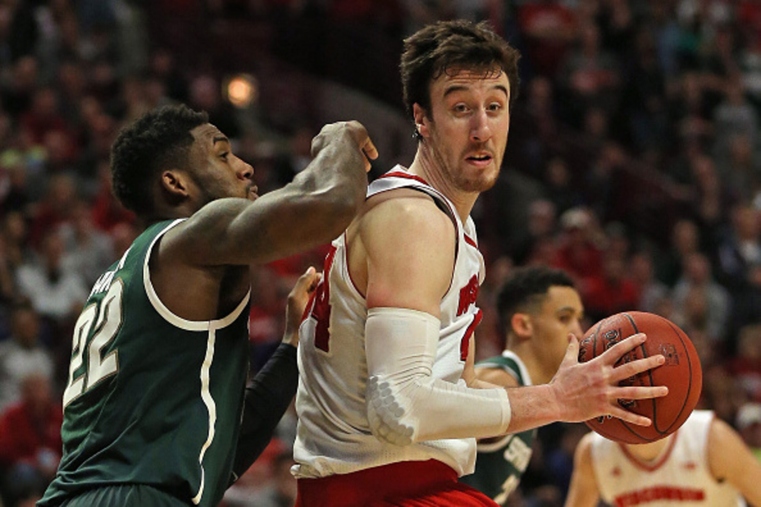 CHICAGO, IL - MARCH 15: Frank Kaminsky #44 of the Wisconsin Badgers moves against Branden Dawson #22 of the Michigan State Spartans during the Championship game of the 2015 Big Ten Men's Basketball Tournament at the United Center on March 15, 2015 in Chic