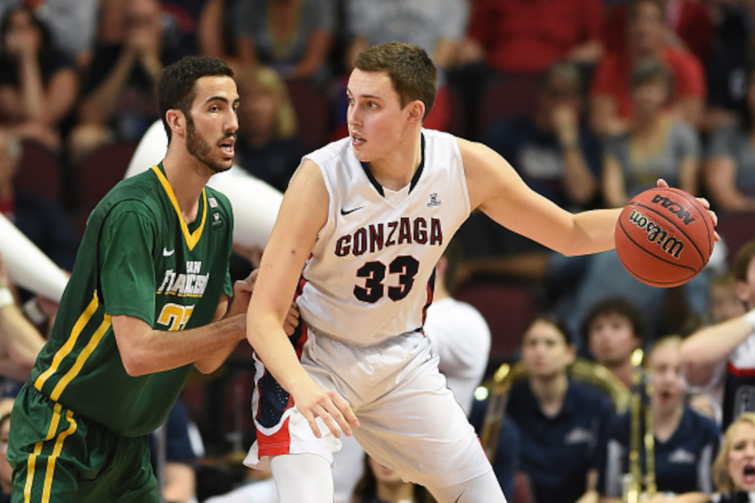 LAS VEGAS, NV - MARCH 07:  Kyle Wiltjer #33 of the Gonzaga Bulldogs is guarded by Mark Tollefsen #23 of the San Francisco Dons during a quarterfinal game of the West Coast Conference Basketball tournament at the Orleans Arena on March 7, 2015 in Las Vegas
