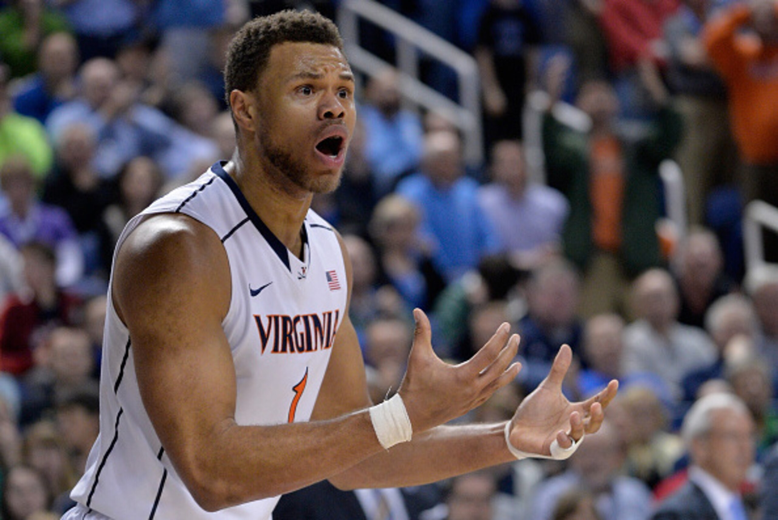 GREENSBORO, NC - MARCH 13:  Justin Anderson #1 of the Virginia Cavaliers reacts after a play against the North Carolina Tar Heels during the semifinals of the 2015 ACC Basketball Tournament at Greensboro Coliseum on March 13, 2015 in Greensboro, North Car